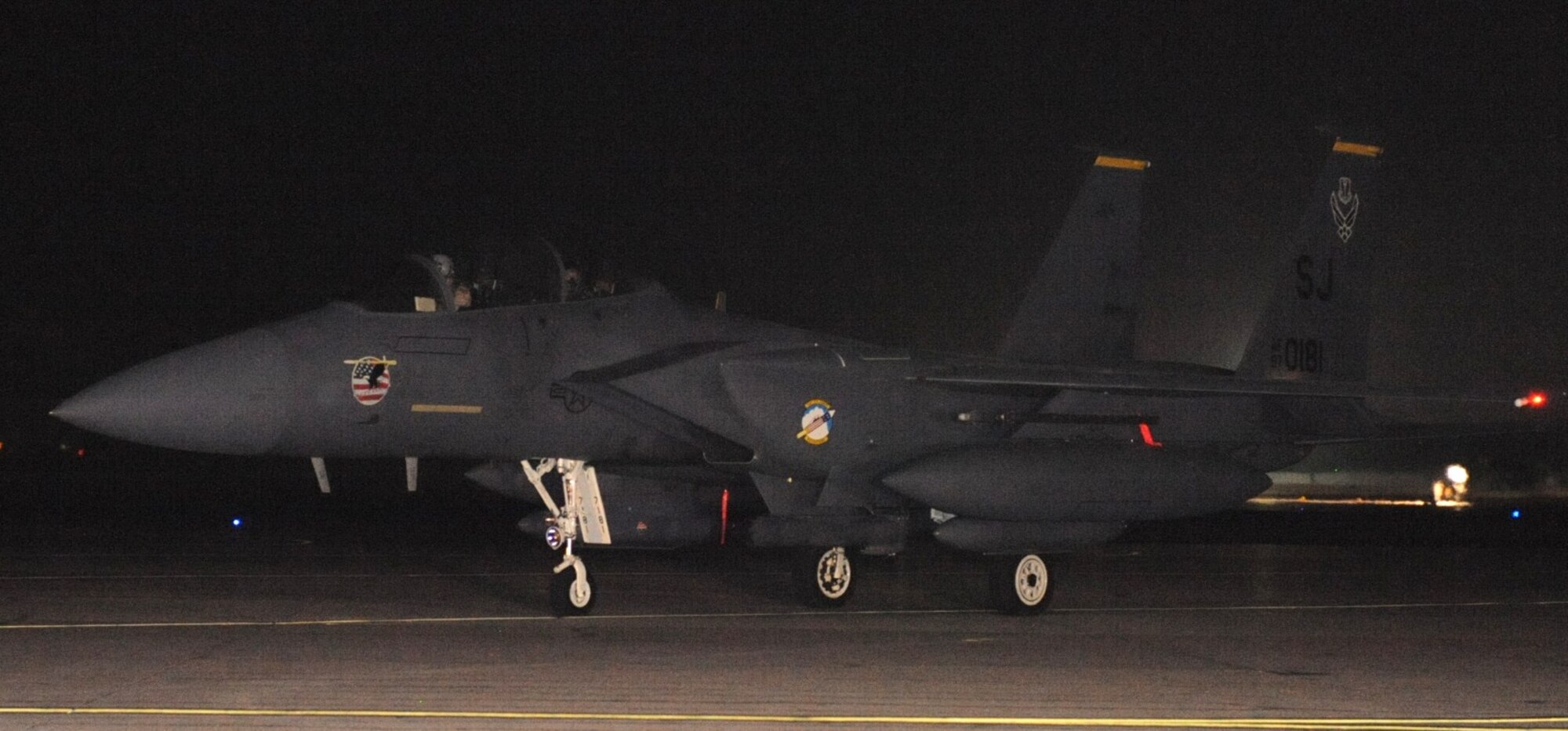 SEYMOUR JOHNSON AIR FORCE BASE, N.C. – Aircrew members aboard an F-15E Strike Eagle from the 336th Fighter Squadron prepare for take-off here Aug. 25, 2010. The aircrew and jet are bound for Bagram Airfield, Afghanistan. While there the deployed aircrew members provide close air support for ground troops. (U.S. Air Force photo/Senior Airman Gino Reyes)