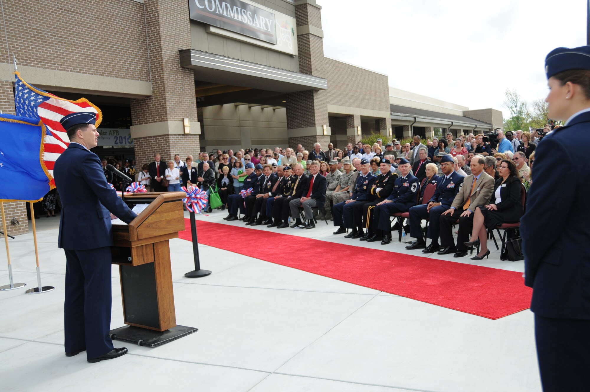 Brig. Gen. Ian Dickinson, former 81st Training Wing commander, speaks at the grand opening of Keesler’s new $60 million shopping center April 6.  The complex includes the main exchange, commissary, food court and pharmacy.  Damages to Keesler totaled more than $900 million when Hurricane Katrina came ashore Aug. 29, 2010.  Other new structures on base include a new student dormitory, the Roberts Consolidated Aircraft Maintenance Facility, fire/crash rescue center, trainer development building, munitions inspection facility, refueler maintenance building and postal center.  The Bay Breeze Event Center opens next month.  (U.S. Air Force photo by Kemberly Groue)
