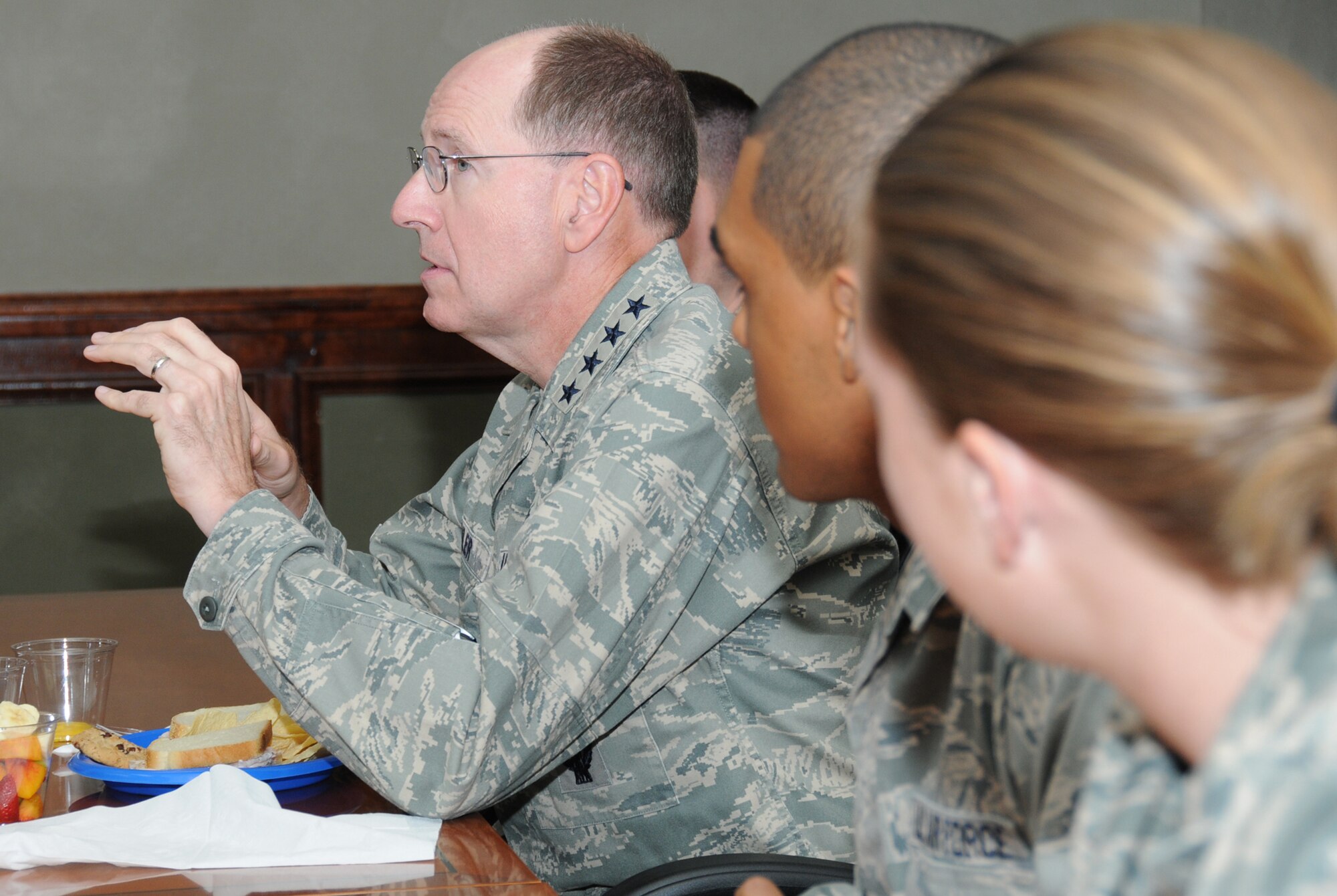 Gen. Robert Kehler, Air Force Space Command commander, has an open discussion with officers from the 333rd Training Squadron’s undergraduate cyber training course during lunch Aug. 17 in Stennis Hall.  Earlier, he was briefed on the course and toured the facility where training takes place.  (U.S. Air Force photo by Kemberly Groue)