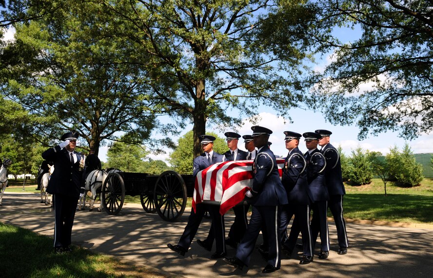 Airmen from the U.S. Air Force Honor Guard carry Capt. David A. Wisniewski to his burial site at Arlington National Cemetery Aug. 23, 2010. Captain Wisniewski, who died July 2 from injuries suffered during a helicopter crash in Afghanistan, was buried in site 60, an area mainly for members who lost their lives fighting in Iraq or Afghanistan. (U.S. Air Force photo/Staff Sgt. Gina Chiaverotti-Paige)
