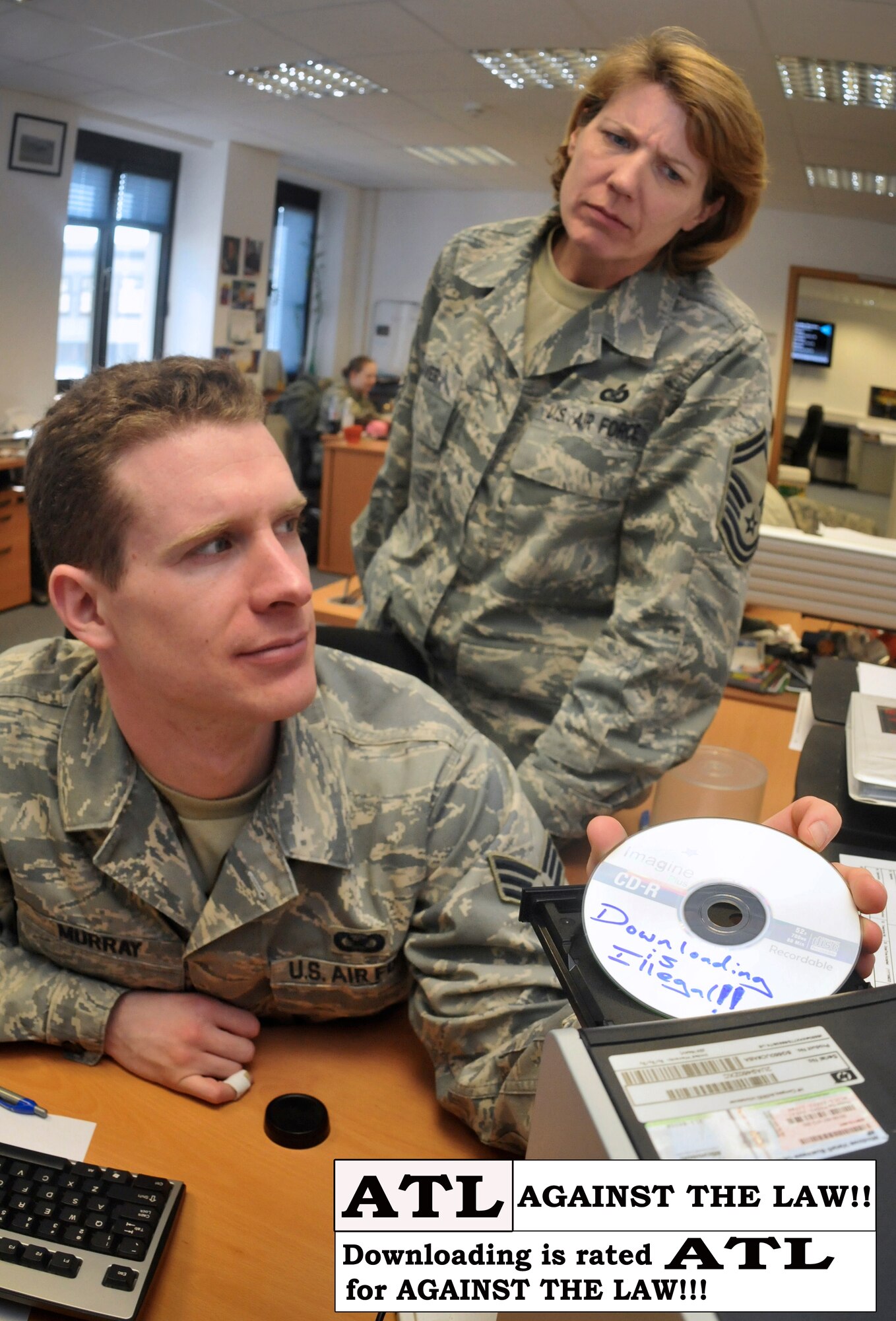 SPANGDAHLEM AIR BASE, Germany - According to the 52nd Fighter Wing Office of the Staff Judge Advocate, downloading media onto a government system violates Article 92 of the Uniformed Code of Military Justice and failure to obey an order or regulation. Punishment for this includes confinement for up to six months. (U.S. Air Force photo illustration/Senior Airman Nick Wilson)