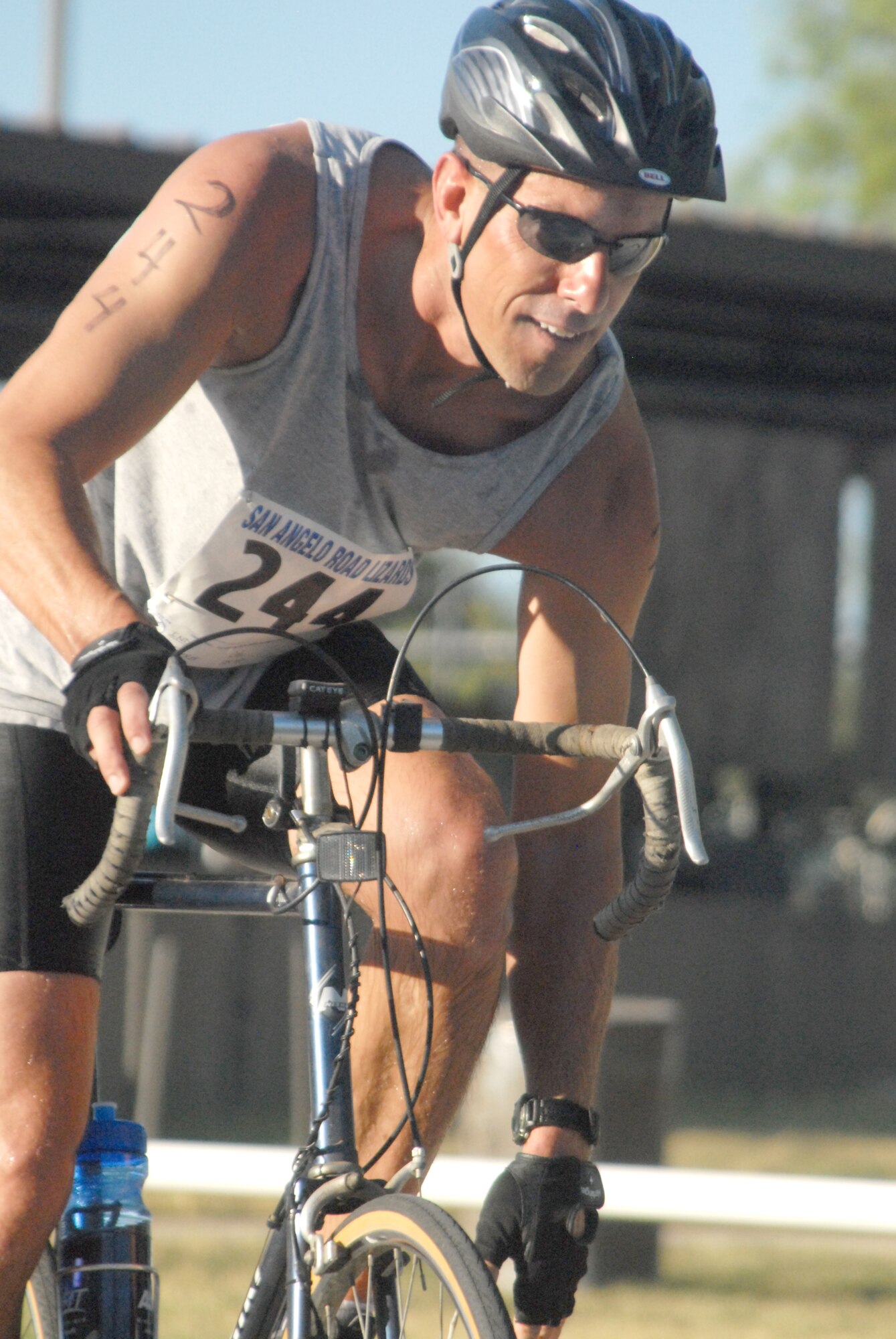 Chief warrant officer three Todd Tarker, Marine Corps Detachment, starts off his second leg of the 2010 Triathlon at the Goodfellow Rec Camp Aug. 21.  The triathlon, open to military and the community, was comprised of a 400-meter swim, 20-kilometer bike ride, and a 5-kilometer run. (U.S. Air Force photo/Connie Hempel)