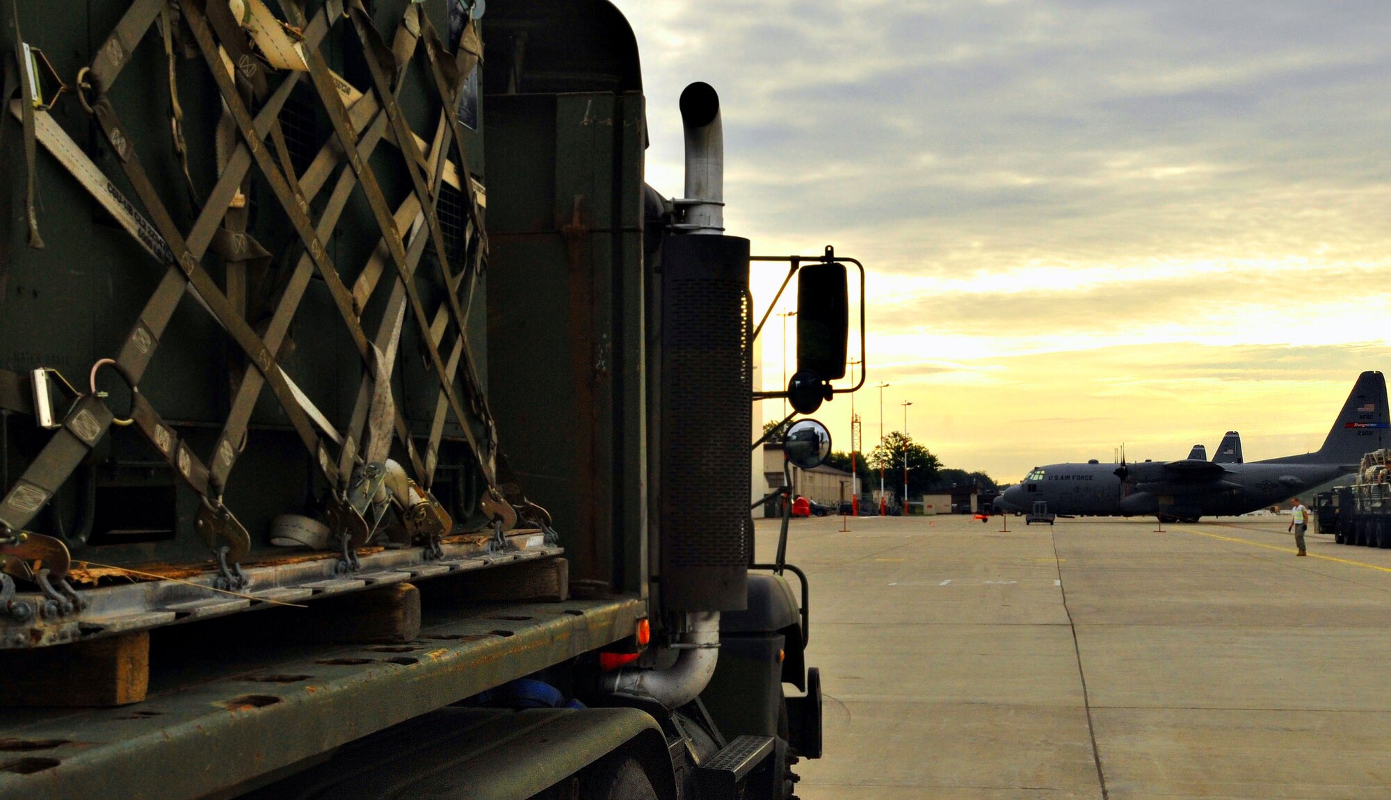 A loaded flatbed truck awaits it's driver during an operational readiness exercise, Ramstein Air Base, Germany, Aug. 25, 2010. An ORE incorporates a series of scenarios to evaluate a base's ability to execute operational duties under simulated wartime conditions. (U.S. Air Force photo by Airman 1st Class Desiree Esposito)