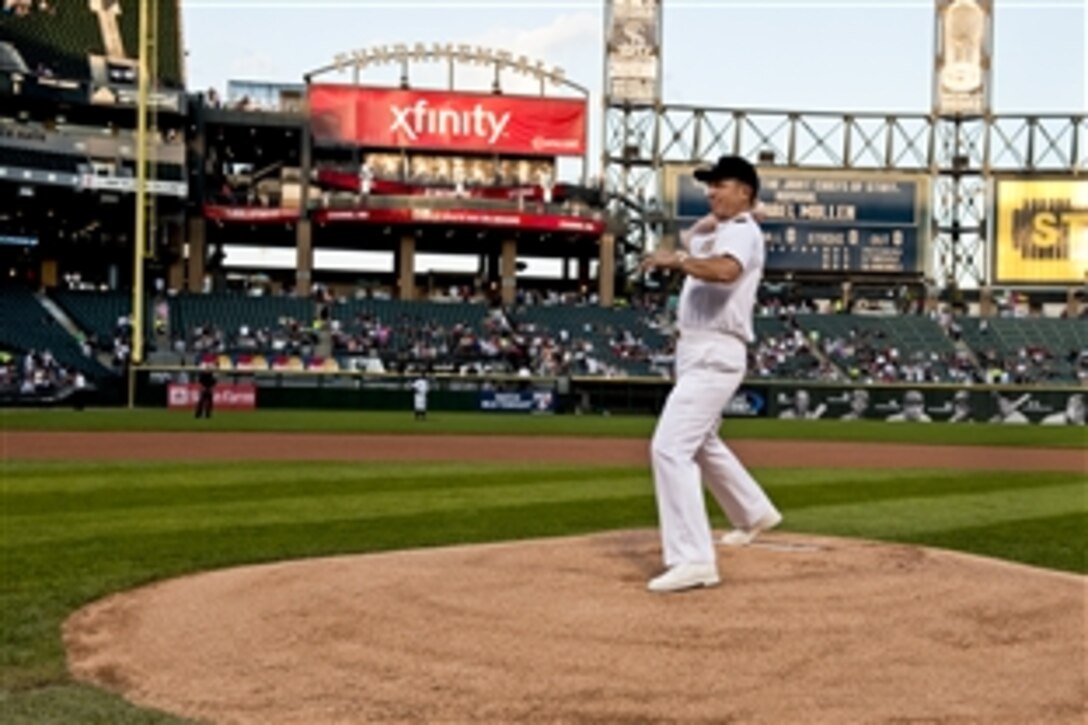 Navy Adm. Mike Mullen, chairman of the Joint Chiefs of Staff, throws out the first pitch before the Chicago White Sox play the Baltimore Orioles at U.S. Cellular Field in Chicago, Aug. 25, 2010. Mullen is on a three-day Midwest tour to discuss the needs of returning troops, their families, and how community leaders can support them. He calls the tour "Conversations with the Country."








