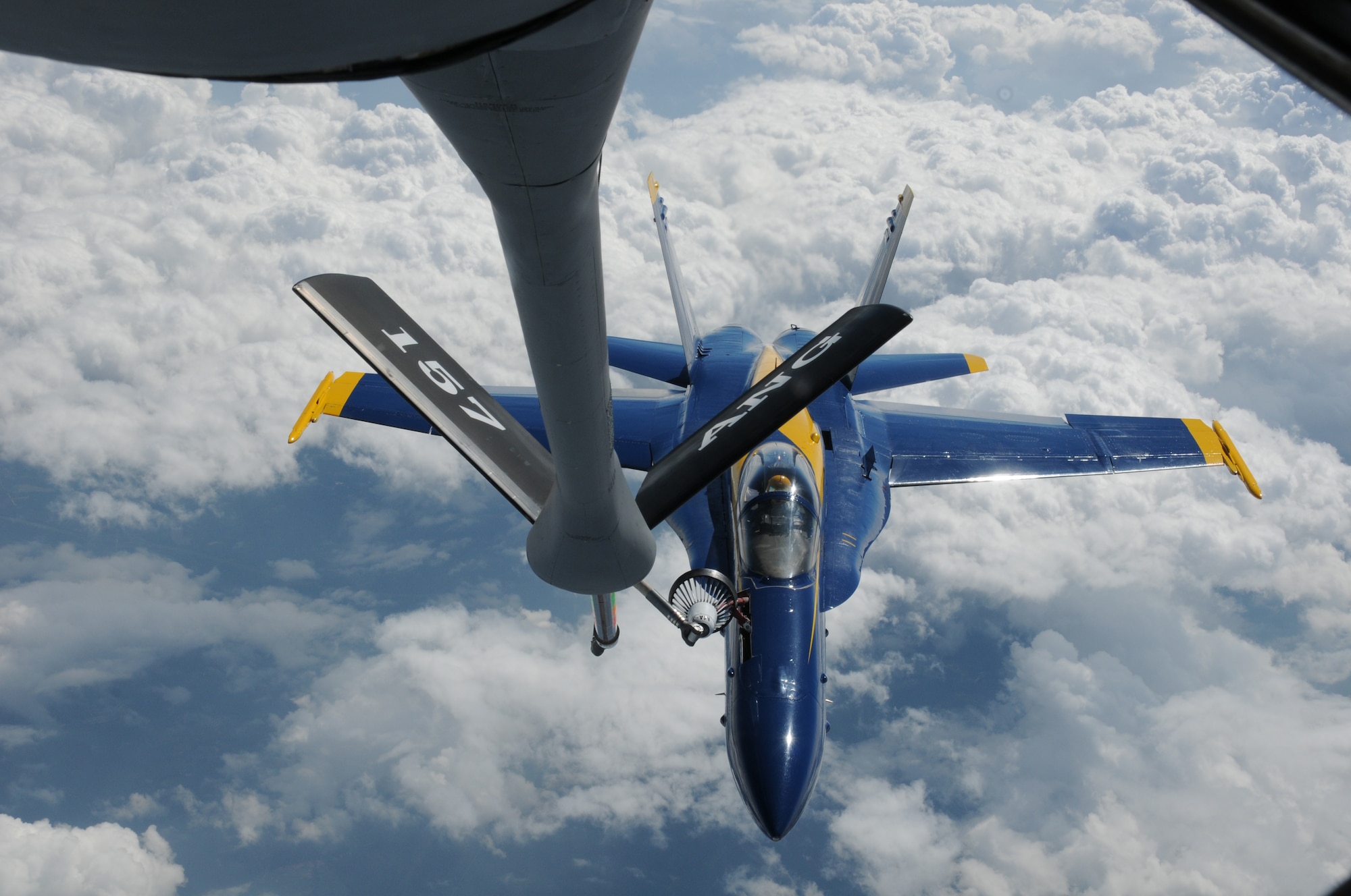 An F/A-18 Hornet belonging to the United States Navy's Flight Demonstration Squadron, the Blue Angels, receives fuel from a KC-135R Stratotanker over the Eastern United States on August 25, 2010.The tanker aircraft and crew are from the 157th Air Refueling Wing at Pease Air National Guard Guard Base, New Hampshire. The Blue Angels are headed to the 2010 Boston New-England Airshow  at Pease International Airport on August 28th-29th 2010. Although the NH Air National Guard won't be hosting the airshow, they will be providing logistical support to the Blue Angels and other military aircraft. (U.S. Air Force photo/Staff Sgt. Curtis J. Lenz)

