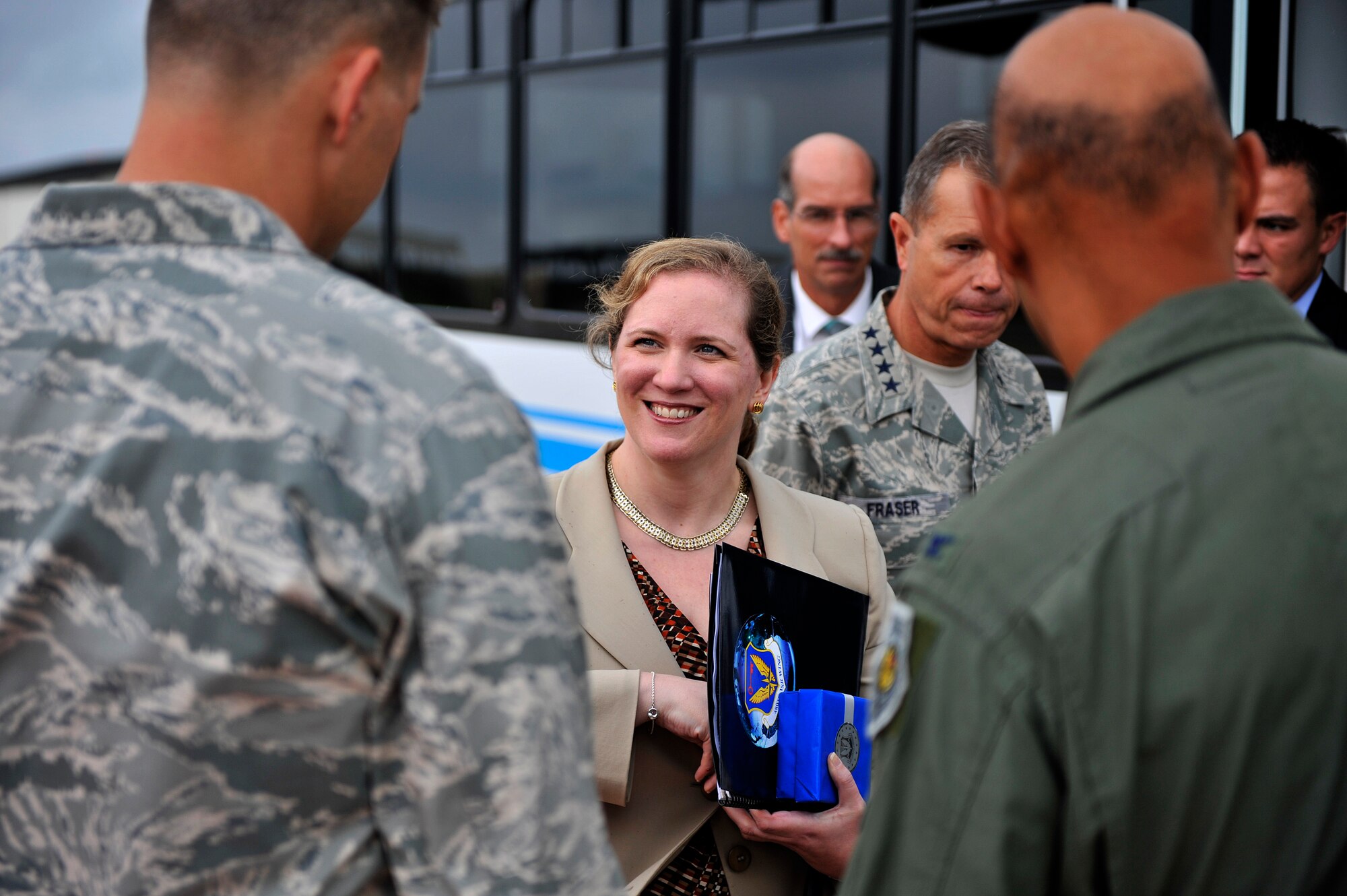A U.S. Air Force C-17 Globemaster III aircraft flight crew from Joint Base Charleston, S.C., greets Under Secretary of the Air Force Ms. Erin C. Conaton at Langley Air Force Base, Va., on Aug. 19, 2010.  Ms. Conaton was given several demonstrations on the capabilities of the C-17 during her flight such as precision air drop and aeromedical evacuation.  (U.S. Air Force Photo/Staff Sgt. Michael B. Keller)

