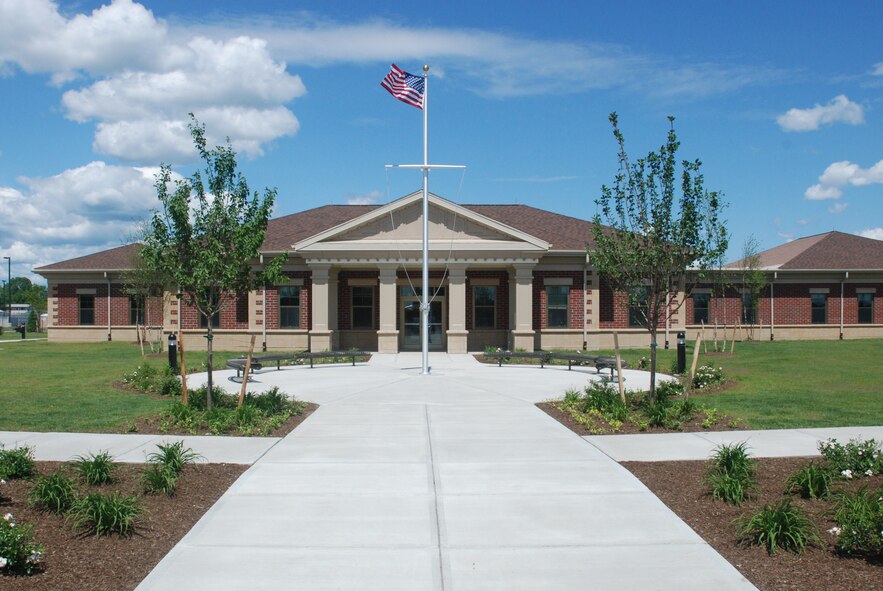 Members of Naval Mobile Construction Battalion 27 officially raised the flag above their new home at Westover Air Reserve Base on Aug. 6, 2010. More than 450 Sailors from throughout the New England region are stationed with the combat construction unit. (Air Force Photo/Timm Huffman)