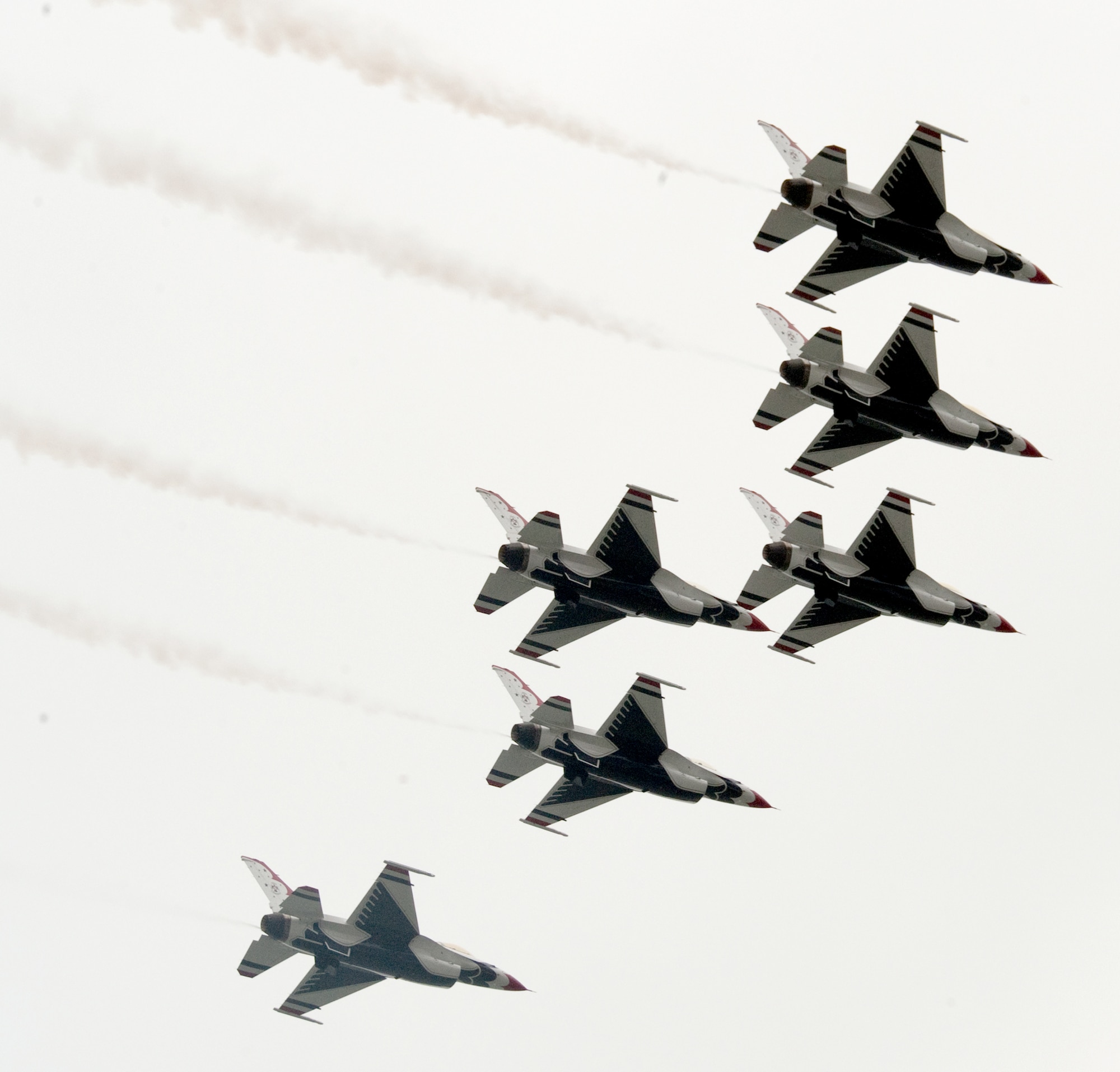 The Thunderbirds, the Air Force aerial demonstration team, flies over the USS Intrepid Sea, Air and Space Museum during the Air Force Week New York City proclamation ceremony Aug. 24. (U.S. Air Force photo/Lance Cheung)