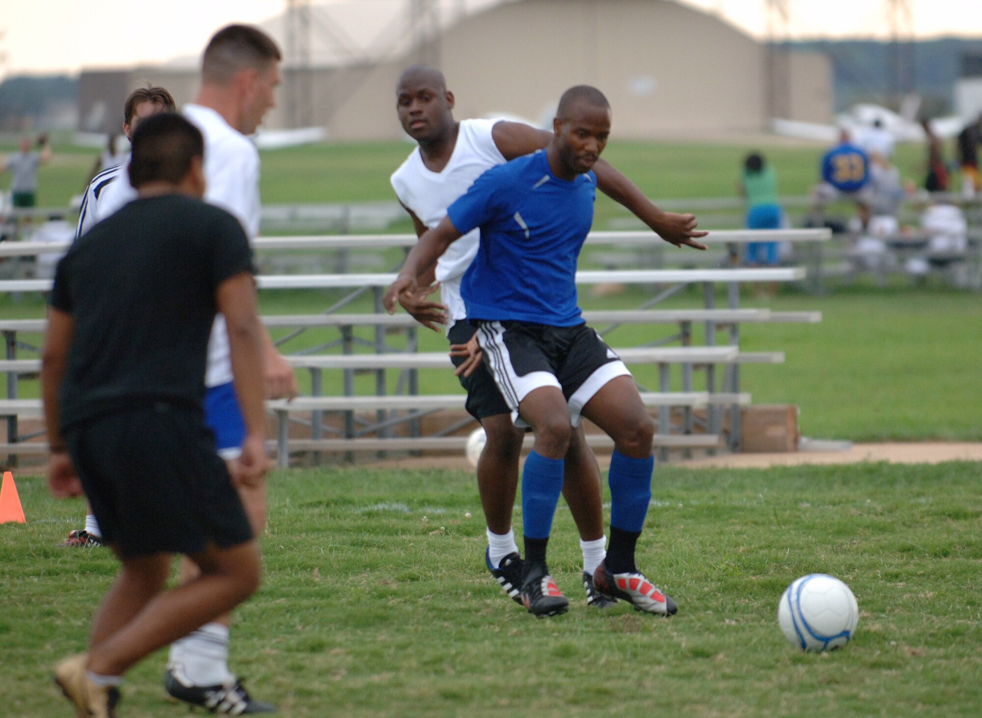 LANGLEY AIR FORCE BASE, Va. -- Members of the Langley men’s varsity soccer team engage in a scrimmage during practice at the Langley athletic fields Aug. 25. The 19-player team will travel to Texas Sept. 2 to participate in the Defender's Cup, a nationwide invitational military tournament over the Labor Day weekend, hosted by Joint Base San Antonio. (U.S. Air Force photo/Airman 1st Class Jason J. Brown)