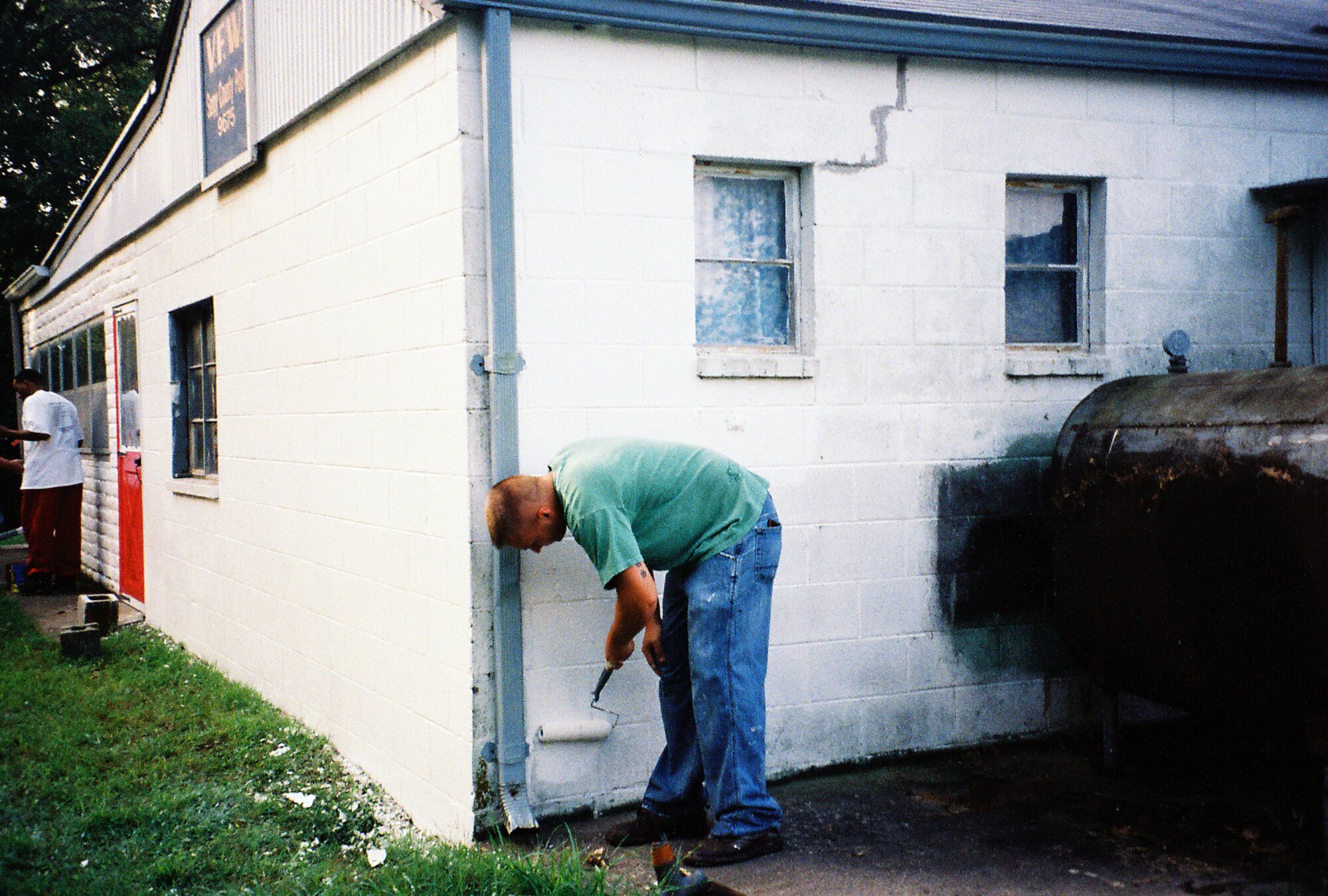 OFFUTT AIR FORCE BASE, Neb. - members of the James M. McCoy Airman Leadership School class 10-G here volunteered at the Veterans of Foreign Wars Sarpy Post in Papillion, Neb. Aug. 21. 
Fifteen class members arrived at VFW Post 9675 at 7 a.m. to paint the building's exterior. The post's membership consists of many elderly veterans who served in WWII, the Korean War and the Vietnam War who are unable to climb ladders or haul heavy material. 
"I don't know what surprised me more," said VFW Post 9675 Commander, retired Lt. Col. Chris Beaty, "the fact that 15 people showed up [so early] on their day off, or the enthusiasm thay had and how hard they worked." Within four hours, the post was prepped, painted and looking brand-new. (Courtesy photo)
