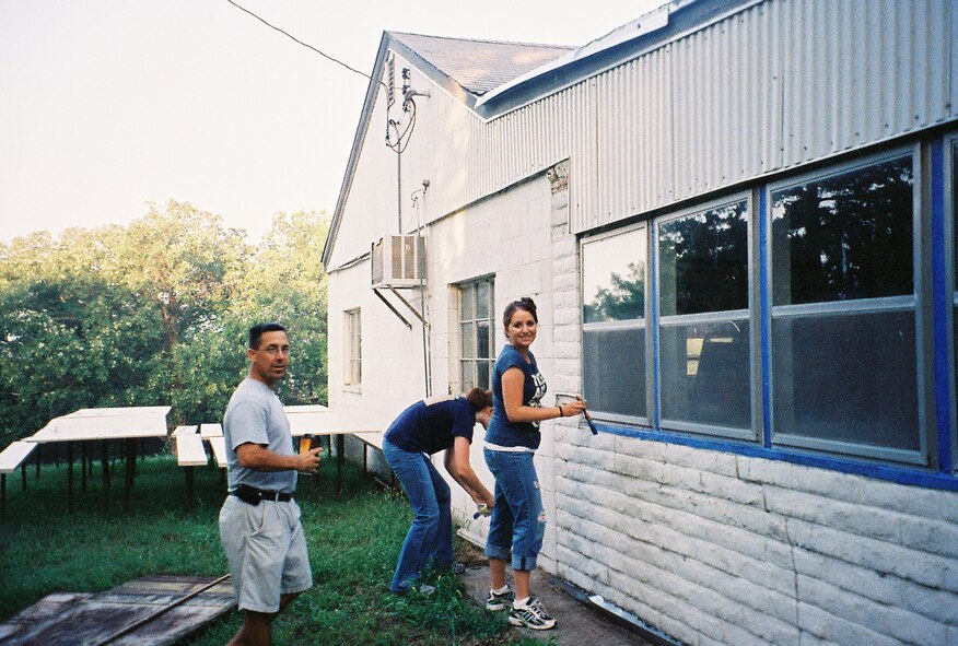 OFFUTT AIR FORCE BASE, Neb. - members of the James M. McCoy Airman Leadership School class 10-G here volunteered at the Veterans of Foreign Wars Sarpy Post in Papillion, Neb. Aug. 21. 
Fifteen class members arrived at VFW Post 9675 at 7 a.m. to paint the building's exterior. The post's membership consists of many elderly veterans who served in WWII, the Korean War and the Vietnam War who are unable to climb ladders or haul heavy material. 
"I don't know what surprised me more," said VFW Post 9675 Commander, retired Lt. Col. Chris Beaty, "the fact that 15 people showed up [so early] on their day off, or the enthusiasm thay had and how hard they worked." Within four hours, the post was prepped, painted and looking brand-new. (Courtesy photo)
