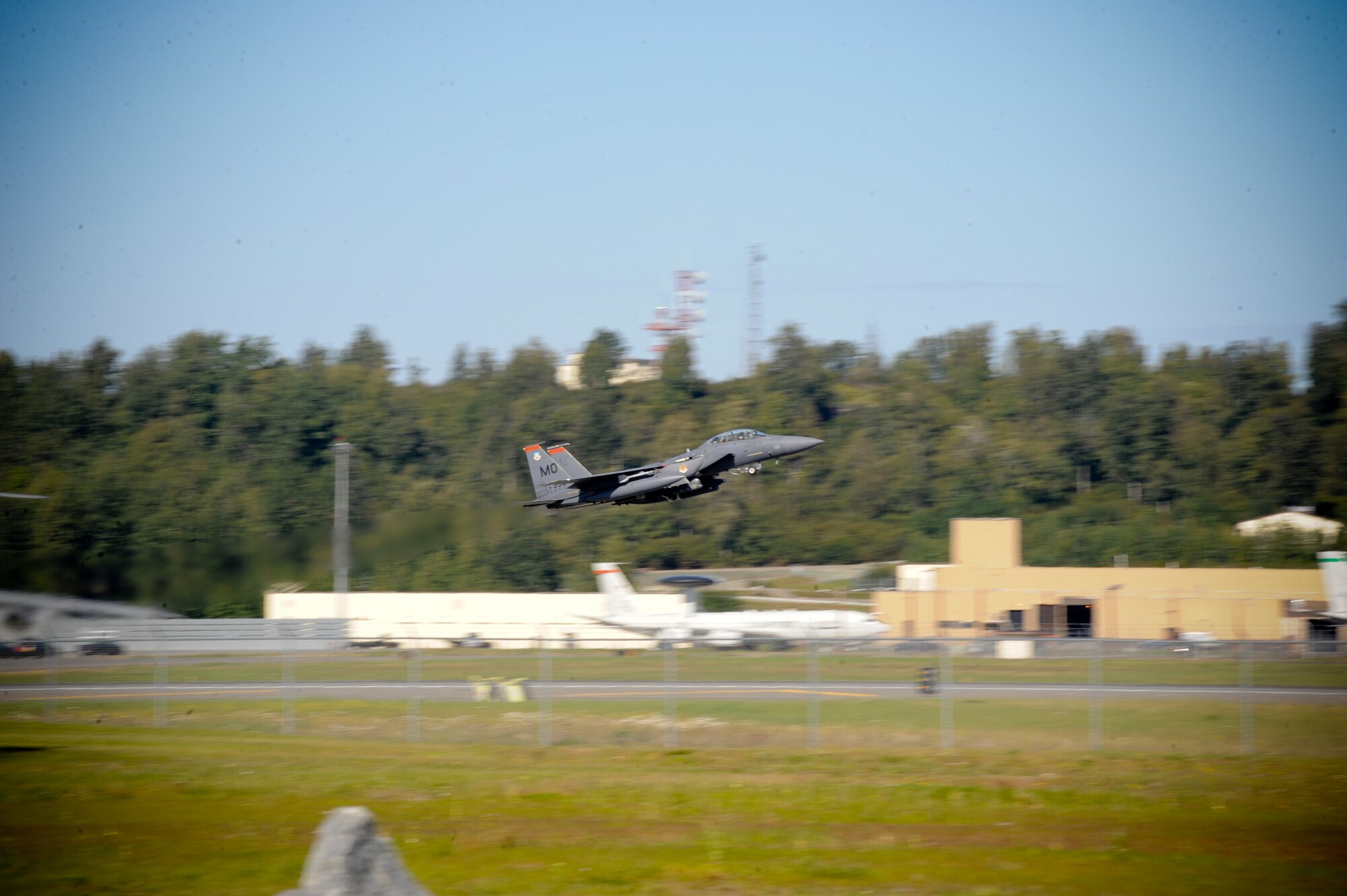 JOINT BASE ELMENDORF-RICHARDSON, Alaska -- An F-15E Strike Eagle, from the 391st Fighter Squadron out of Mountain Home Air Force Base, Idaho, takes flight here Aug. 25. The 391st FS is currently assigned to Joint Base Elmendorf-Richardson for a temporary duty assignment to aid in training exercises for the F-22 Raptor Squadrons stationed here. (U.S. Air Force Photo by Staff Sgt. Joshua Garcia)
