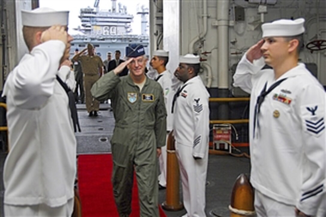 U.S. Air Force Gen. Douglas Fraser arrives aboard the amphibious assault ship USS Kearsarge for a guided tour in Norfolk, Va., Aug. 24, 2010. Fraser is visiting the Norfolk to meet with the participants of PANAMAX, a multinational exercise to enhance regional cooperation and the ability of participating nations to respond to threats to the Panama Canal.