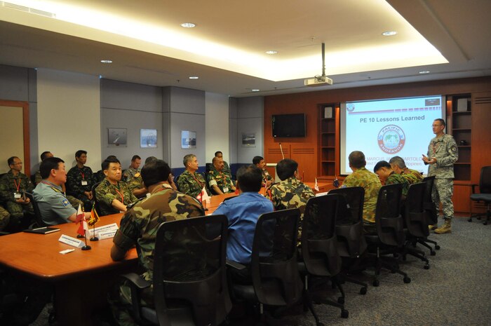 U.S. Army Lt. Col. Justin Pickett gives a lessons learned presentation to senior military communicators from 16 Asia-Pacific nations during Pacific Endeavor workshop. Hosted by the Singapore Armed Forces and U.S. Pacific Command, Pacific Endeavor is a humanitarian communication workshop that brings together militaries, non-governmental organizations, and private industry to fully test communication procedures during natural disasters.