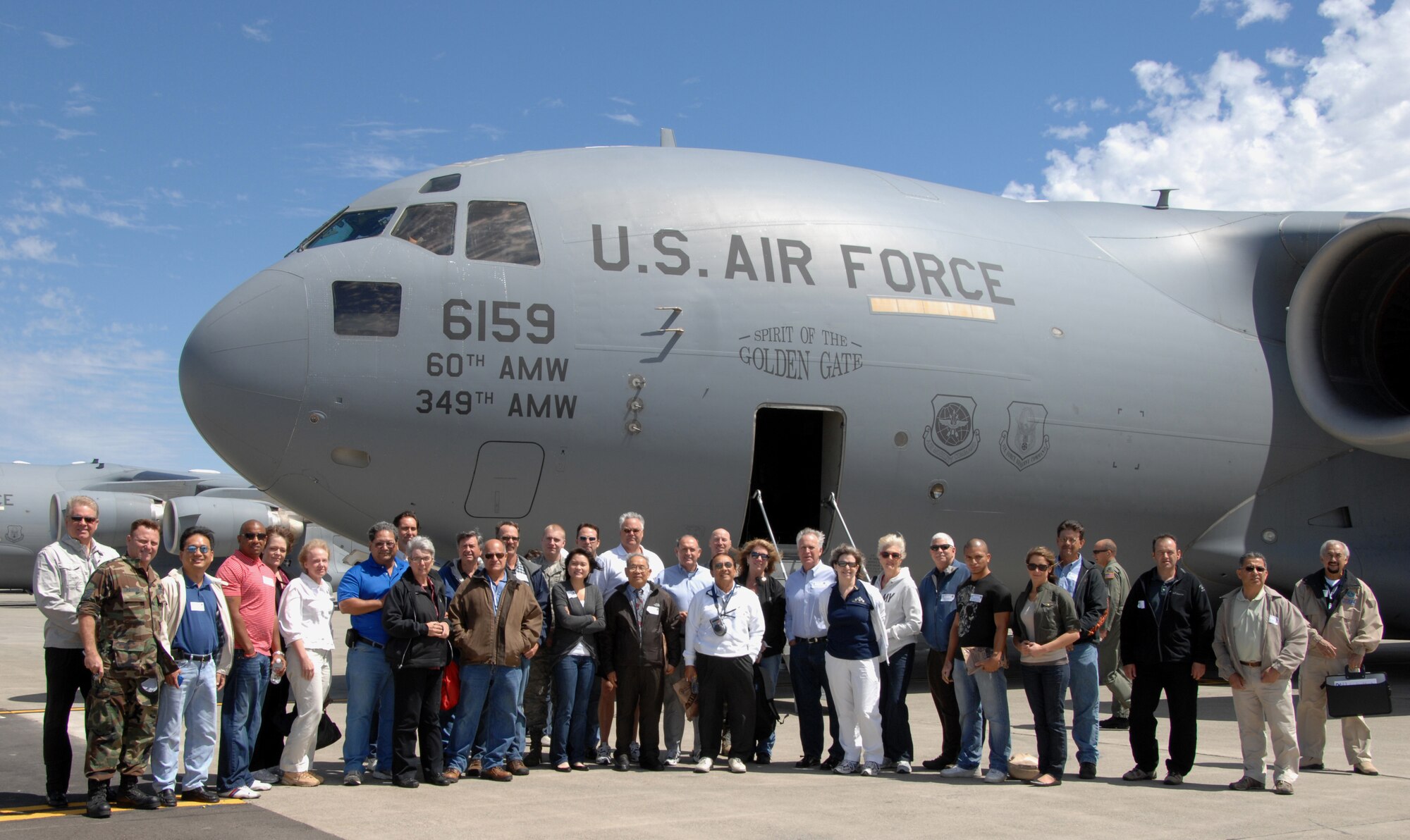 Employer Kristin Verzola toured the flight deck of the KC-10 as it hovered abovethe C-17.