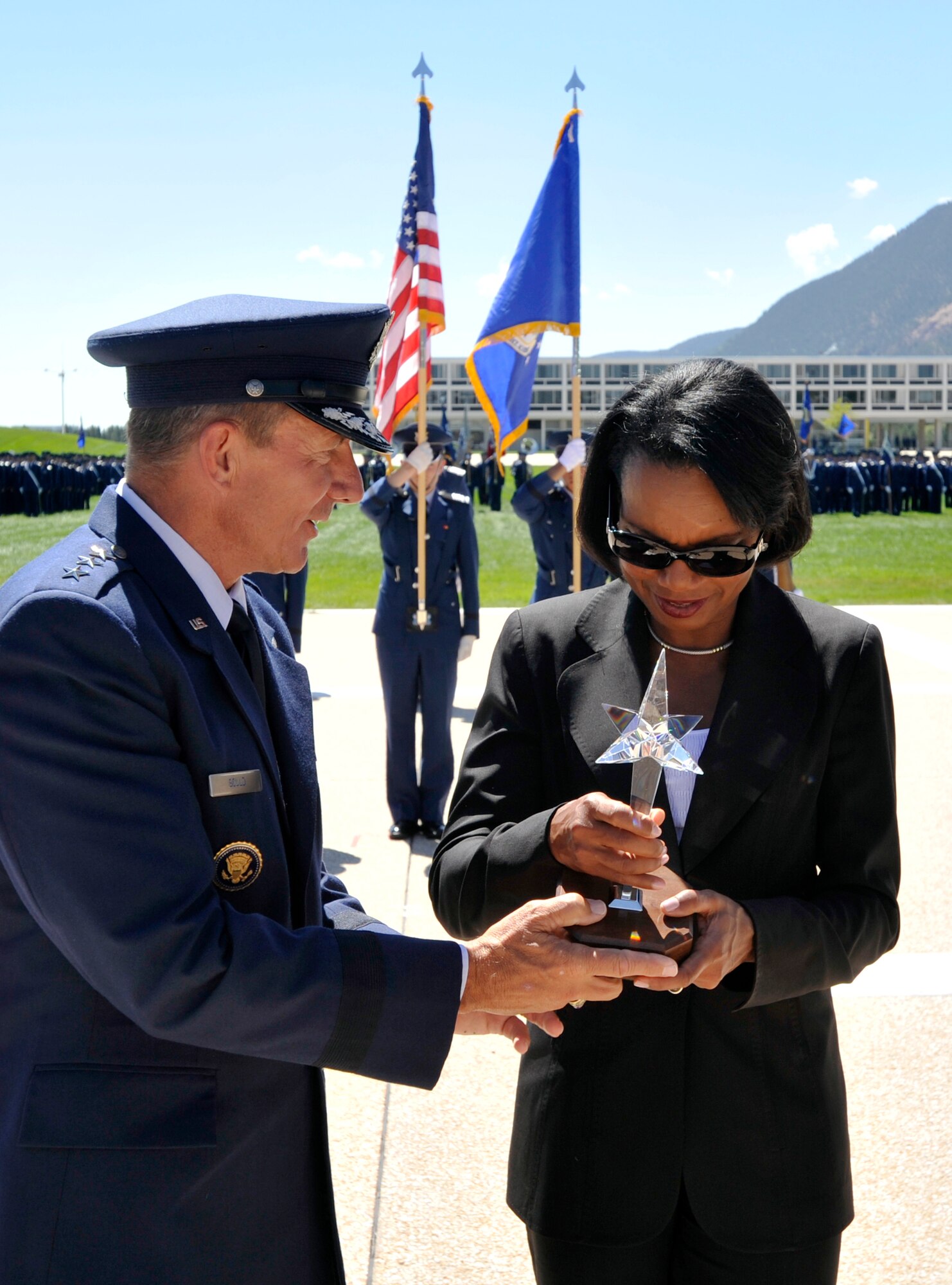 Lt. Gen. Mike Gould presents Dr. Condoleezza Rice with the 2009 Thomas D. White Award at the Air Force Academy Aug. 26, 2010, for her contributions to national security and defense during her career as a professor, presidential adviser, diplomat, author and national security expert. Previous TD White Award winners include Gens. Curtis LeMay, Billy Mitchell and Bernard Schriever, Sen. John Glenn and President George H.W. Bush. (U.S. Air Force photo/Bill Evans)