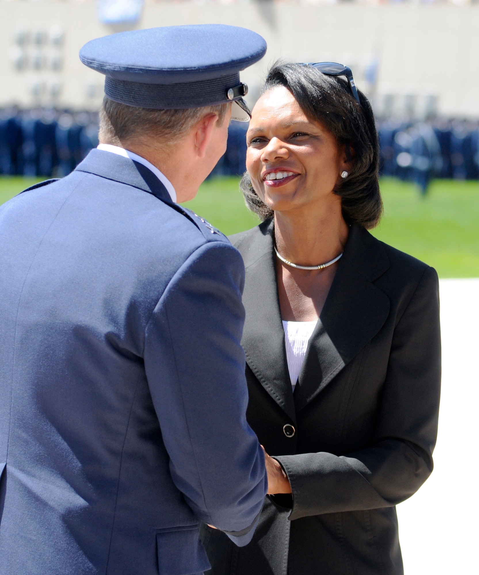 Lt. Gen. Mike Gould shakes hands with Dr. Condoleezza Rice during a parade in her honor at the Air Force Academy Aug. 26, 2010. Dr. Rice, a Stanford professor and former secretary of state, was named the Thomas D. White Award for her accomplishments during her career as a professor, presidential adviser, diplomat, author and national security expert. General Gould is the Academy superintendent. (U.S. Air Force photo/Bill Evans)