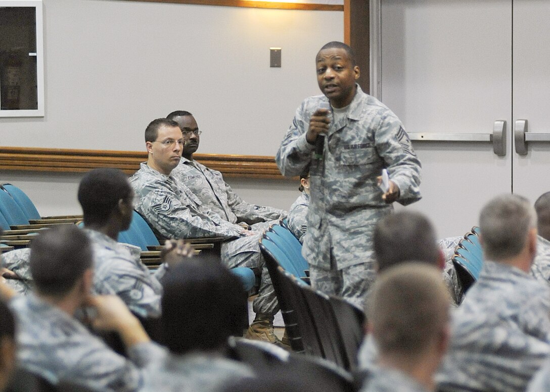 JOINT BASE ANDREWS, Md. -- Chief Master Sgt. Anthony Brinkley, 316th Wing/Joint Base Andrews command chief, speaks to an audience of 316 WG enlisted members during his first enlisted call at the Base Theater auditorium Aug. 24. Chief Brinkley answered questions from enlisted members and spoke about wing goals and plans for the near and distant future.  (U.S. Air Force photo by Senior Airman Melissa Brownstein)