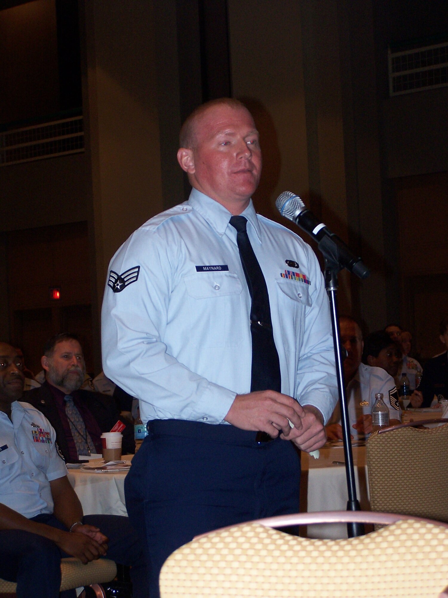 Senior Airman Shane Maynard, an active Air Force Sergeants Association member, asks Chief Master Sergeant of the Air Force James Roy a question during the Professional Airmen’s Conference and International Convention in Atlanta, Ga., Aug. 17.  Air Force Sergeants Association Chapter 1054 sponsored the Airman to attend the event, which featured two-way communication and presentations about Air Force issues.  Guest speakers included Roy, Secretary of the Air Force Michael Donley, a panel of retired chief master sergeants, Pacific Air Forces Commander Gen. Gary North, and other Air Force leaders and decision makers.  (U.S. Air Force courtesy photo)