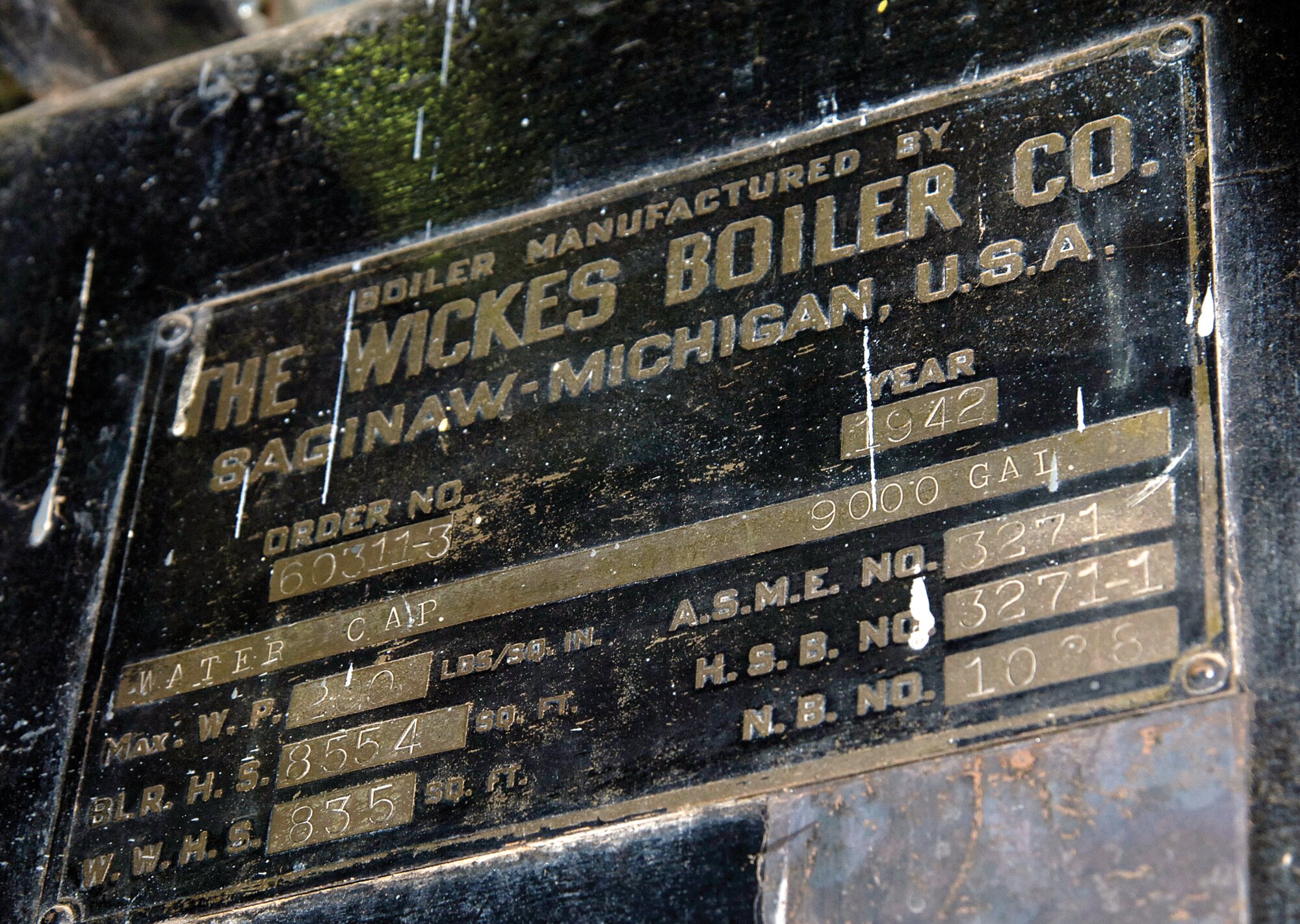 A placard shows that boilers were built on site in 1942, just a year after America entered World War II with the attack on Pearl Harbor.  The four boilers still provide steam for industrial processes and personal heat for workers. Though rarely needing such output, the boilers can crank out up to 80,000 pounds of steam an hour. (Air Force photo by Margo Wright)