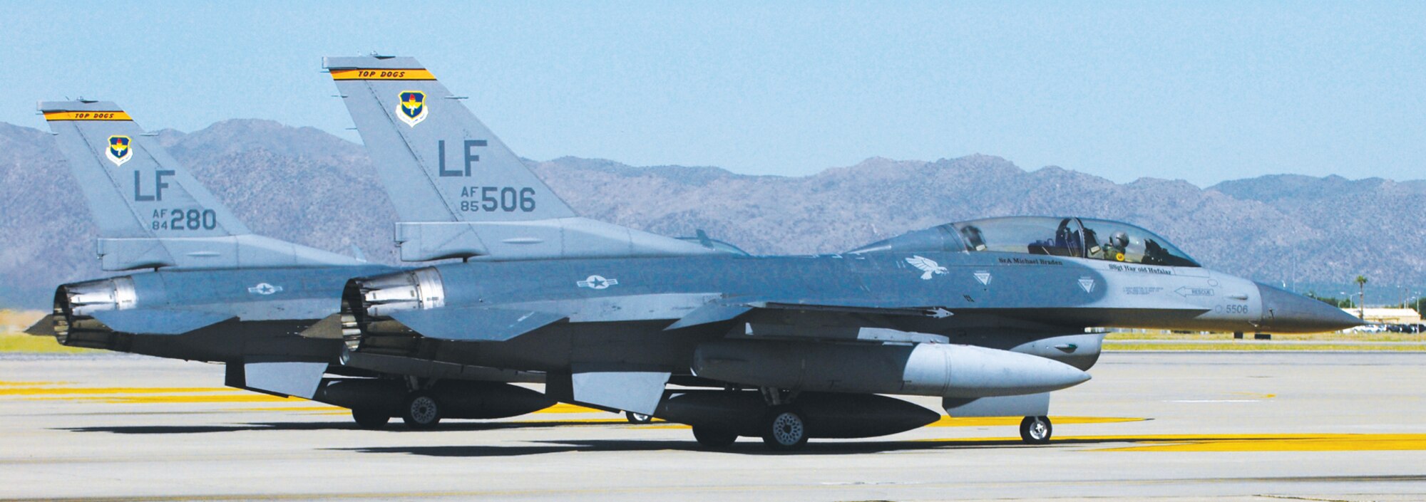 The last two F-16 Fighting Falcons from the 61st Fighter Squadron, Luke Air Force Base leaves Luke Air Force Base for their final flight on Aug. 24th.  Both jets were flown to be decommissioned as part of the Combat Air Force restructuring plan to retire legacy fighters.  (U.S. Air Force photo\Airman 1st Class Sandra Welch)