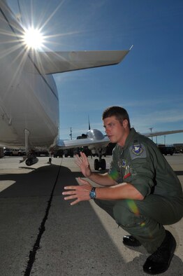 HOLLOMAN AIR FORCE BASE, N.M. -- Capt. Reid Larson explains details about an inert Laser Maverick attached to a highly modified C-12J during an interview, Aug. 25, 2010. The Laser Maverick is an air-to-ground missile that can seek out laser-designated targets. This is the first time the 586th Flight Test Squadron has tested external stores on the modified C-12J. Captain Larson is the chief flight test engineer with the 586th FLTS. (U.S. Air Force photo/Airman 1st Class Joshua Turner)
