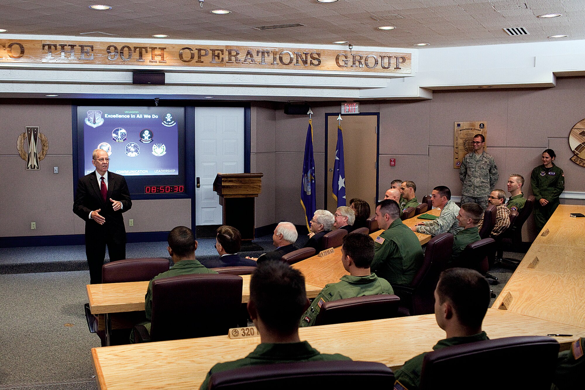 Gen. (ret) Larry D. Welch led a Defense Science Board Permanent Task Force on nuclear weapons surety as part of an Air Force nuclear enterprise review Tuesday and Wednesday. Gen. Welsh is seen giving a briefing to the 90th Operations Group leadership in the pre-departure briefing room in Bldg. 1292. Other members of the DSB task force are Dr. James Tegnelia, Vice Adm. (ret) G. Robert Nanos, Jr., Dr. Robert Seldon, David McDarby, Brenda Poole and Maj. Christopher Cruise. (U.S. Air Force photo by Jeff Allred)