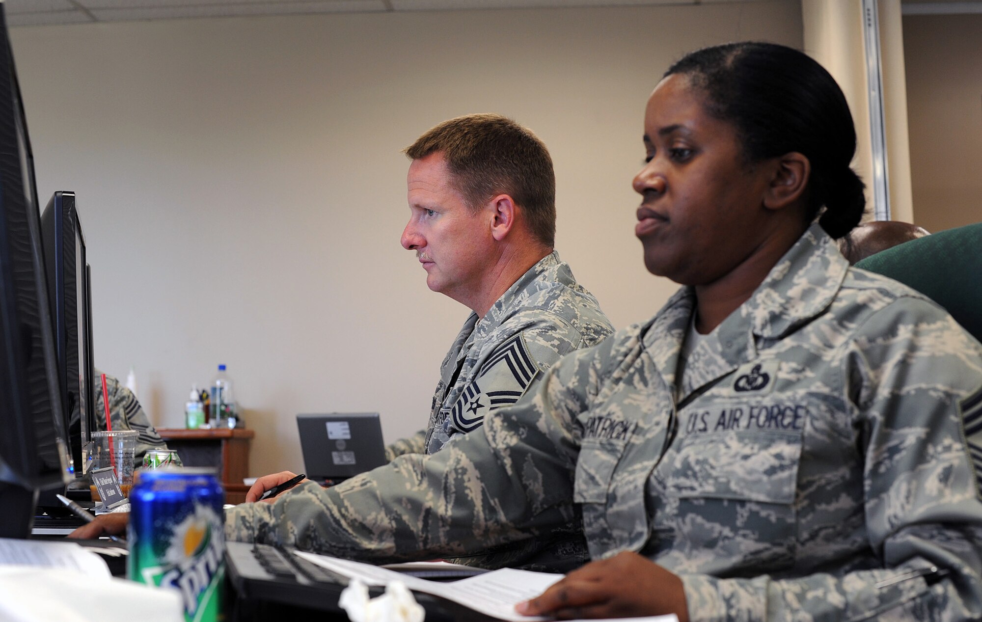 Chief Master Sgts. Erik Anderson (L) and Ingrid Fitzpatrick participate in the first Reserve enlisted development team at the Air Reserve Personnel Center in Denver Aug. 23-27. The team gave career and education advice to more than 830 chief master sergeants throughout the Air Reserve Component. (Photo by Greg Simmonds)
