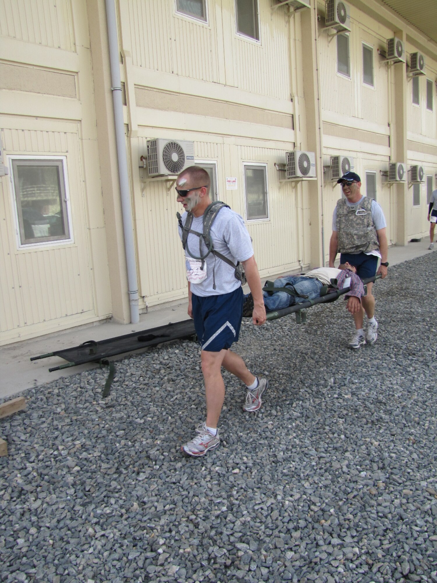 KABUL, Afghanistan - Airmen from the Combined Air Power Transition Force participate in the "Amazing Race" event held jointly at the International Security Assistance Force and Afghan Air Force base's on Aug. 27, 2010. The race was both physically and mentally challenging as the contestants would decipher clues that would lead them to the variety of mixed events during the race including volleyball, face paint and blind ball toss, map reading. (U.S. Air Force photo by Capt. Rob Leese/RELEASED).