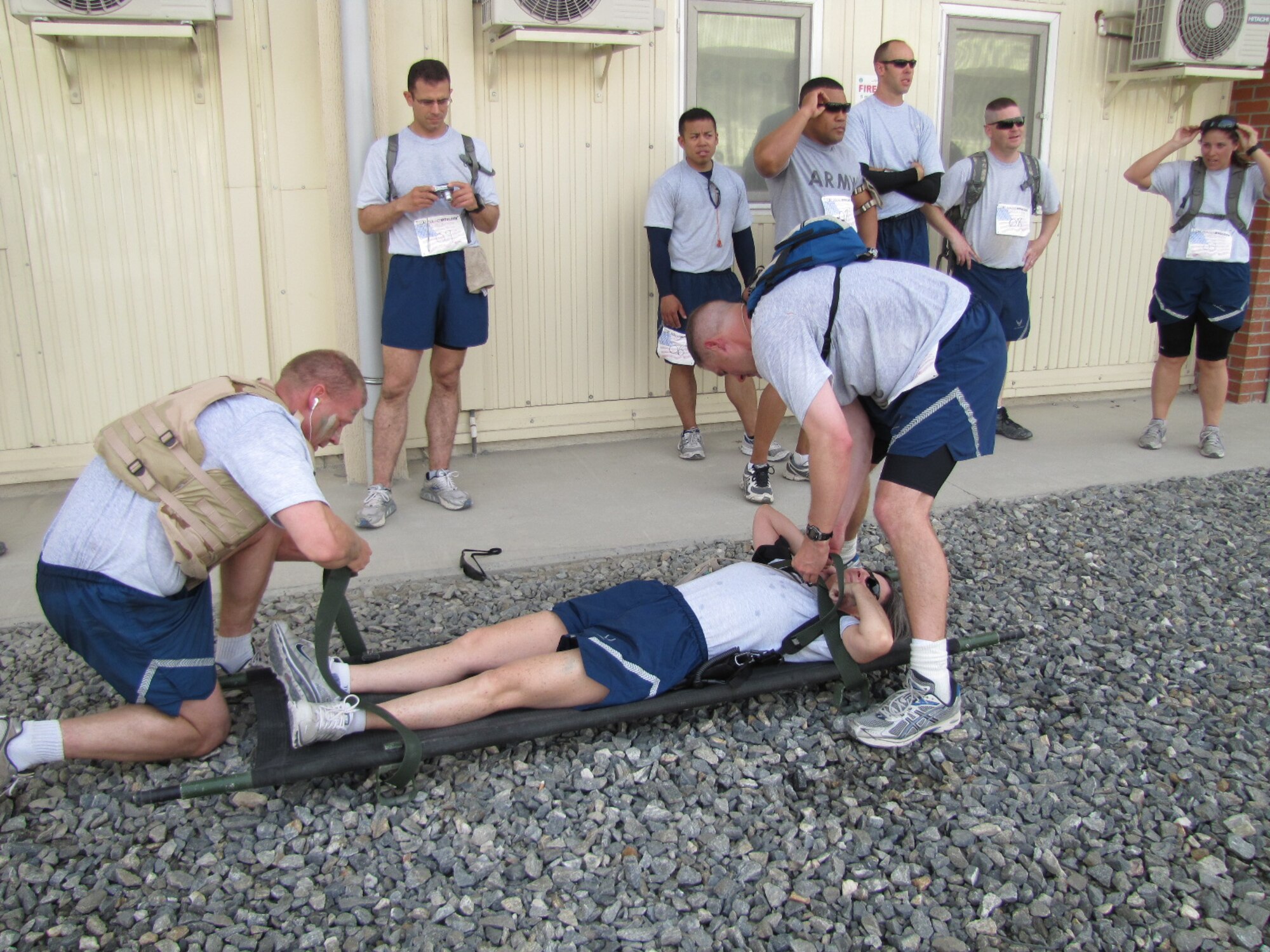 KABUL, Afghanistan - Airmen from the Combined Air Power Transition Force participate in the "Amazing Race" event held jointly at the International Security Assistance Force and Afghan Air Force base's on Aug. 27, 2010. The race was both physically and mentally challenging as the contestants would decipher clues that would lead them to the variety of mixed events during the race including volleyball, face paint and blind ball toss, map reading. (U.S. Air Force photo by Capt. Rob Leese/RELEASED).