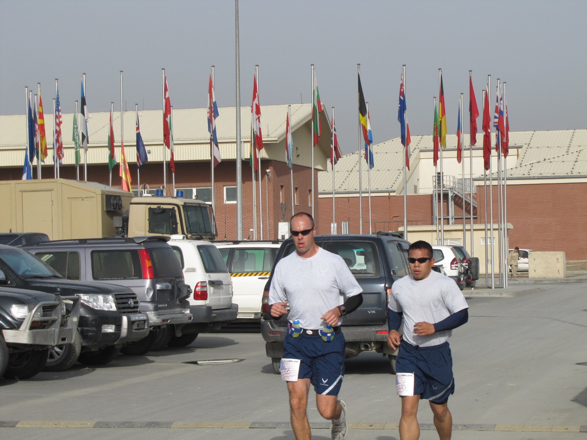 KABUL, Afghanistan - Airmen from the Combined Air Power Transition Force participate in the "Amazing Race" event held jointly at the International Security Assistance Force and Afghan Air Force base's on Aug. 27, 2010. The race was both physically and mentally challenging as the contestants would decipher clues that would lead them to the variety of mixed events during the race including volleyball, face paint and blind ball toss, map reading. (U.S. Air Force photo by Capt. Rob Leese/RELEASED).