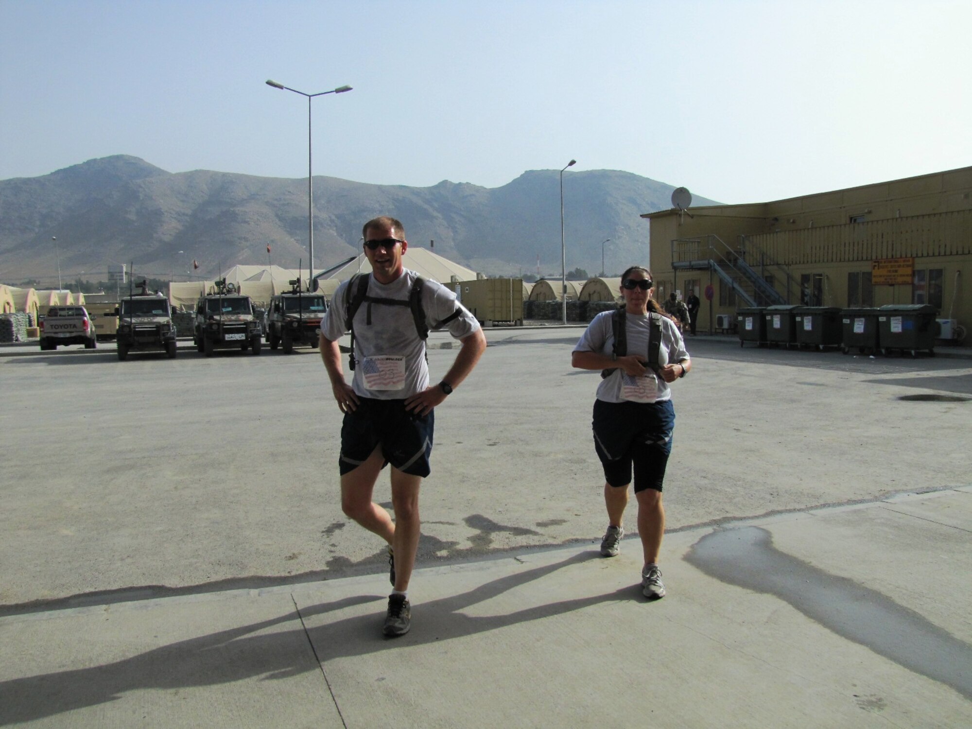 KABUL, Afghanistan - Airmen from the Combined Air Power Transition Force participate in the "Amazing Race" event held jointly at the International Security Assistance Force and Afghan Air Force base's on Aug. 27, 2010. The race was both physically and mentally challenging as the contestants would decipher clues that would lead them to the variety of mixed events during the race including volleyball, face paint and blind ball toss, map reading. (U.S. Air Force photo by Capt. Rob Leese/RELEASED).