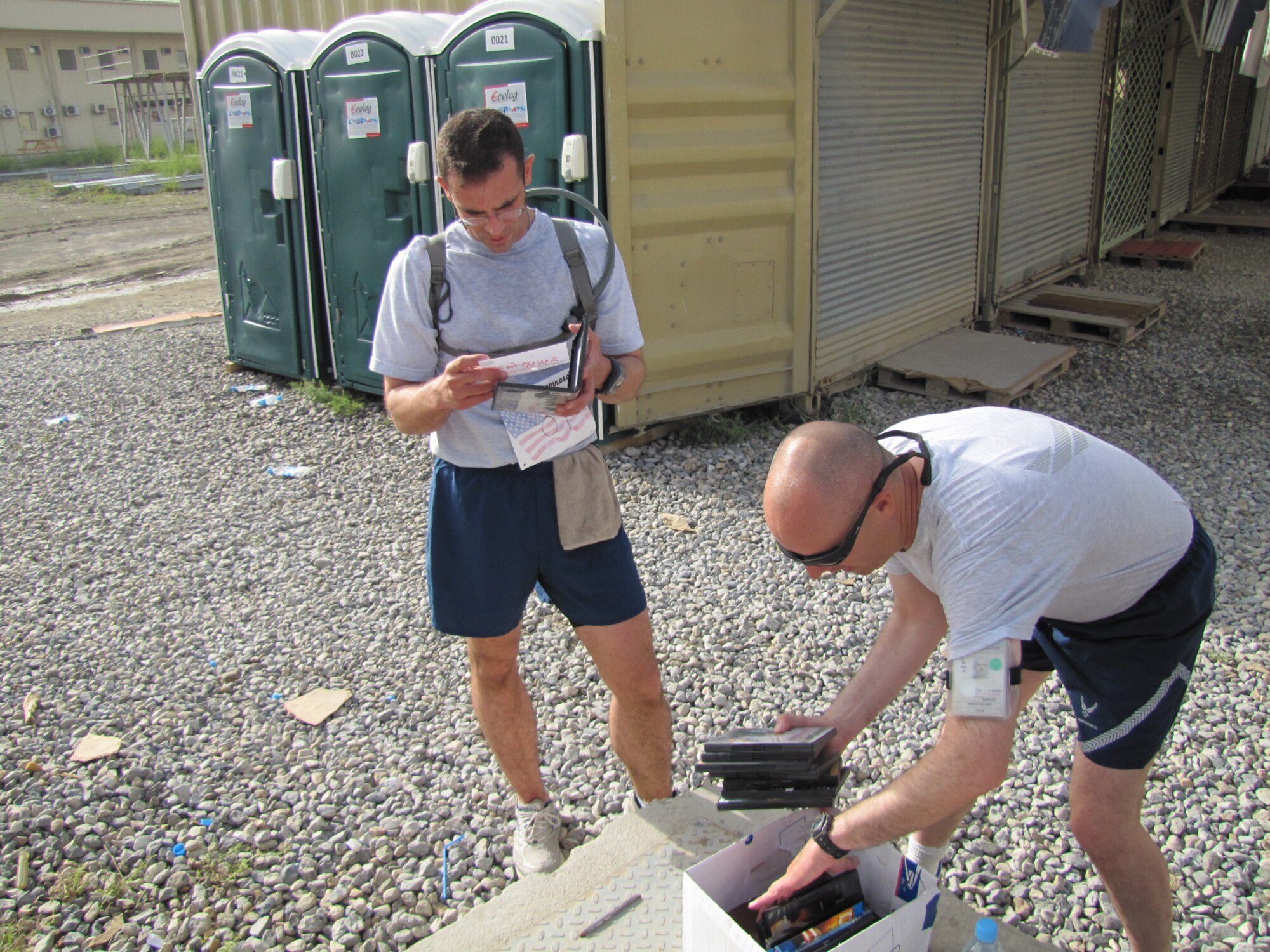 KABUL, Afghanistan - Airmen from the Combined Air Power Transition Force participate in the "Amazing Race" event held jointly at the International Security Assistance Force and Afghan Air Force base's on Aug. 27, 2010. The race was both physically and mentally challenging as the contestants would decipher clues that would lead them to the variety of mixed events during the race including volleyball, face paint and blind ball toss, map reading. (U.S. Air Force photo by Capt. Rob Leese/RELEASED).
