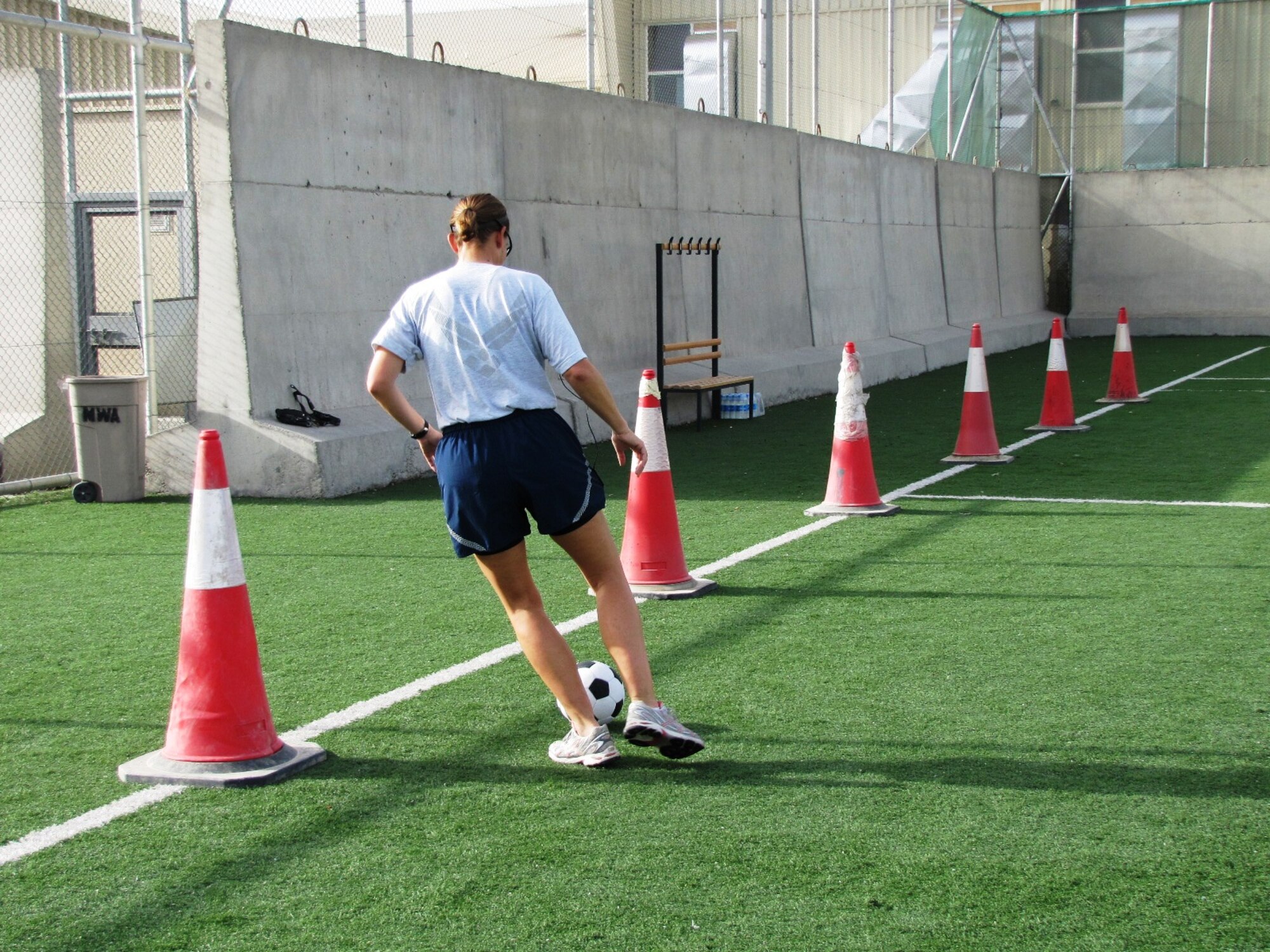 KABUL, Afghanistan - Airmen from the Combined Air Power Transition Force participate in the "Amazing Race" event held jointly at the International Security Assistance Force and Afghan Air Force base's on Aug. 27, 2010. The race was both physically and mentally challenging as the contestants would decipher clues that would lead them to the variety of mixed events during the race including volleyball, face paint and blind ball toss, map reading. (U.S. Air Force photo by Capt. Rob Leese/RELEASED).