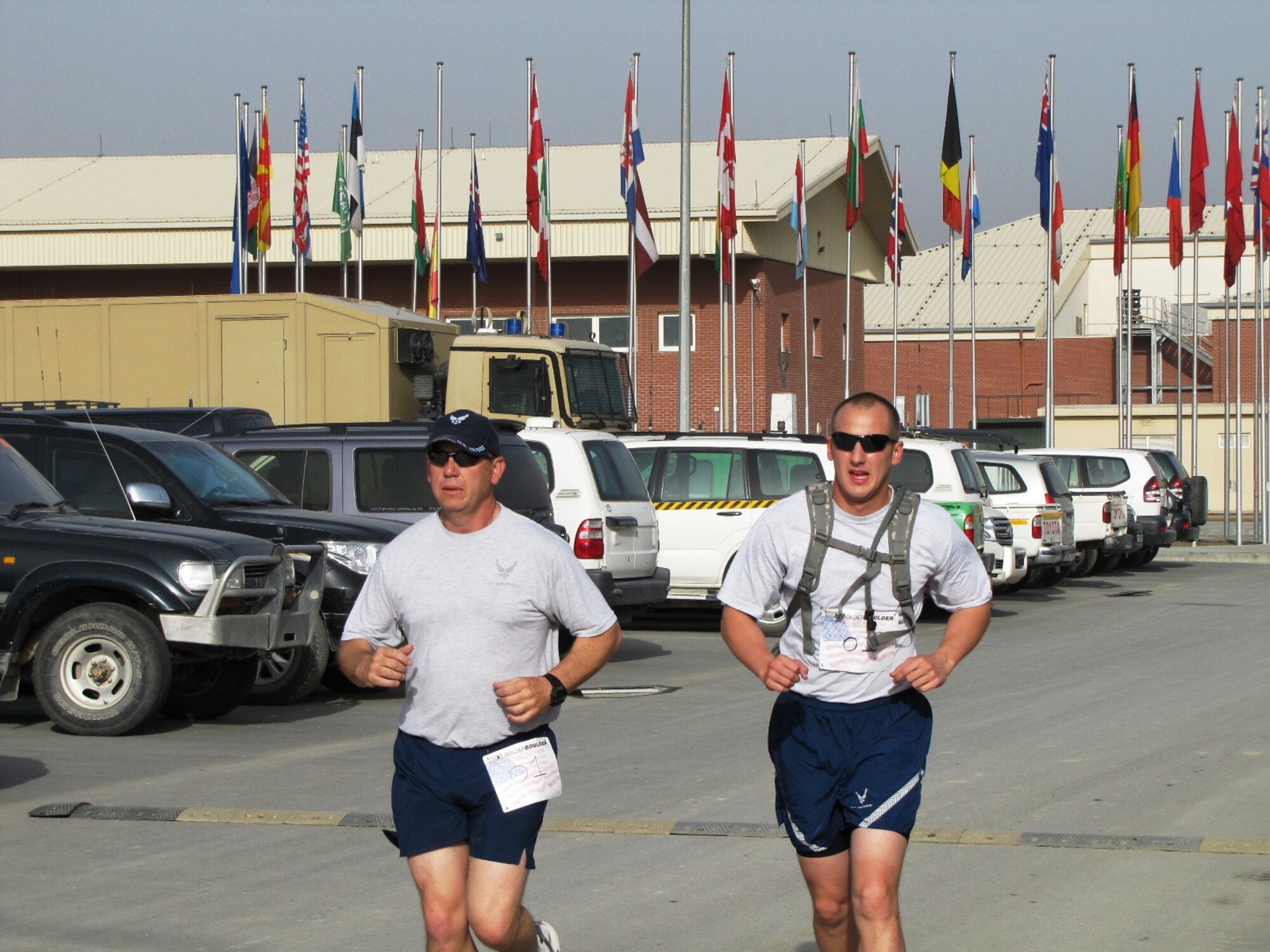 KABUL, Afghanistan - Airmen from the Combined Air Power Transition Force participate in the "Amazing Race" event held jointly at the International Security Assistance Force and Afghan Air Force base's on Aug. 27, 2010. The race was both physically and mentally challenging as the contestants would decipher clues that would lead them to the variety of mixed events during the race including volleyball, face paint and blind ball toss, map reading. (U.S. Air Force photo by Capt. Rob Leese/RELEASED).