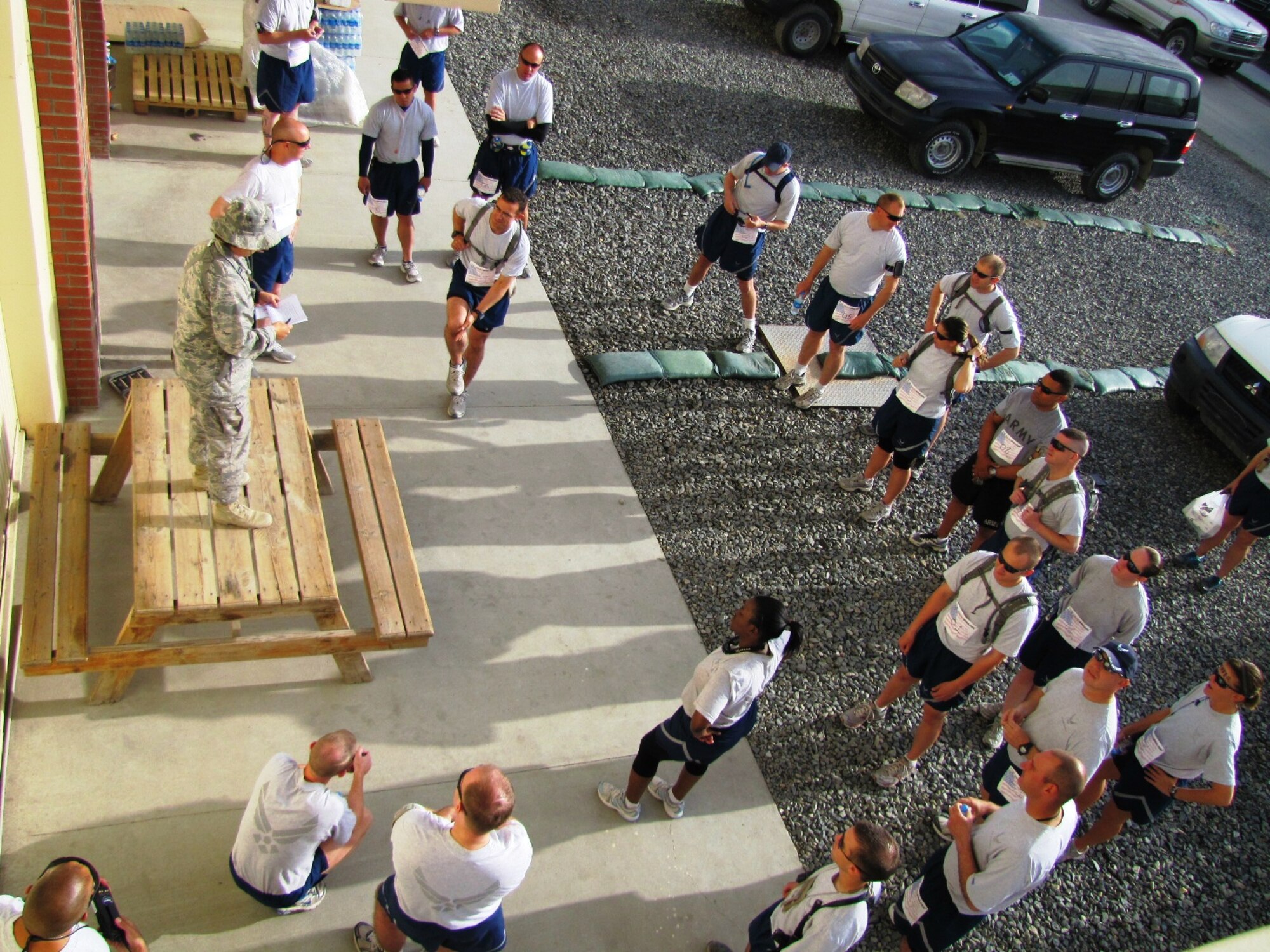 KABUL, Afghanistan - Airmen from the Combined Air Power Transition Force participate in the "Amazing Race" event held jointly at the International Security Assistance Force and Afghan Air Force base's on Aug. 27, 2010. The race was both physically and mentally challenging as the contestants would decipher clues that would lead them to the variety of mixed events during the race including volleyball, face paint and blind ball toss, map reading. (U.S. Air Force photo by Capt. Rob Leese/RELEASED).