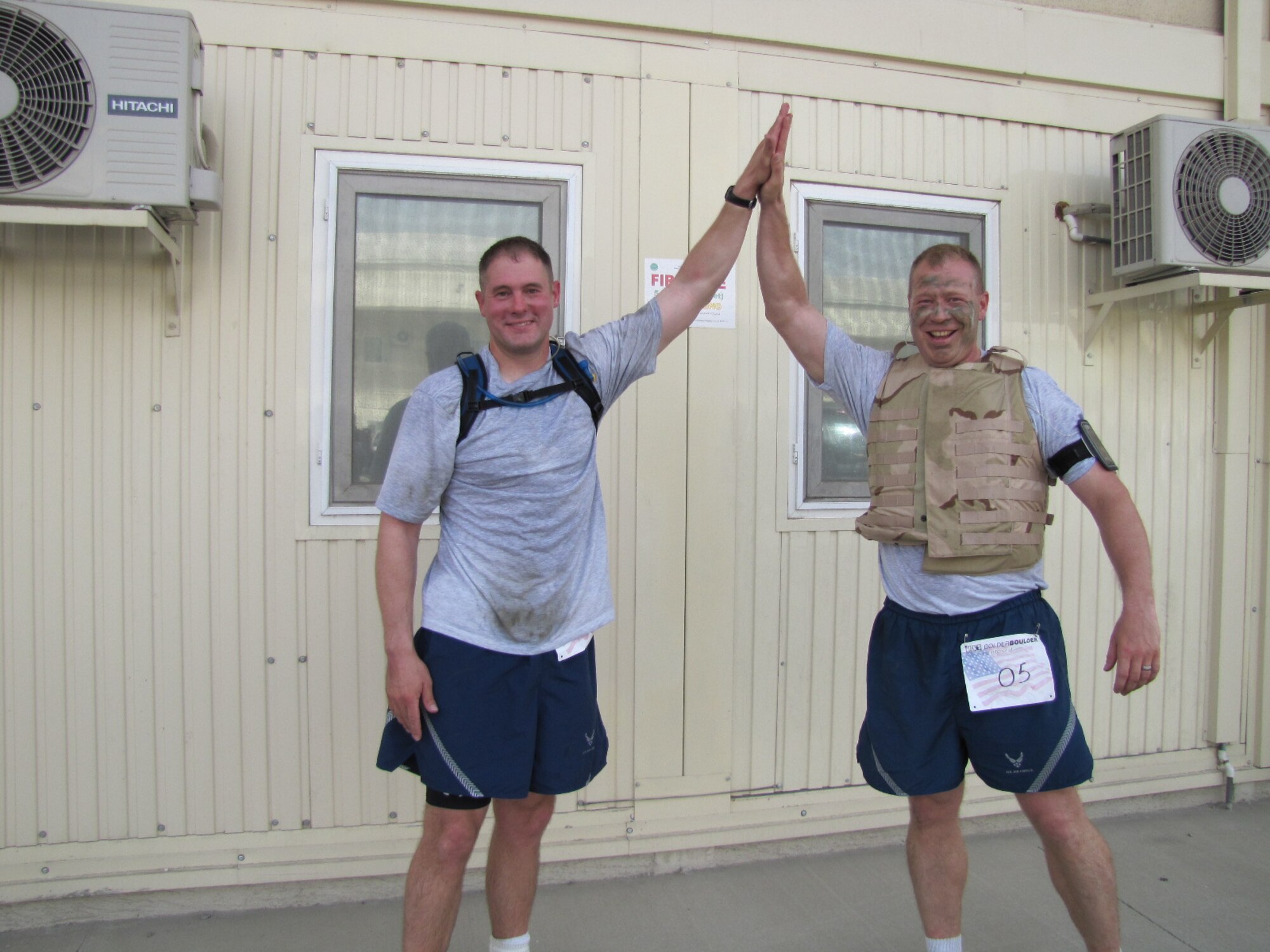 KABUL, Afghanistan - Airmen from the Combined Air Power Transition Force participate in the "Amazing Race" event held jointly at the International Security Assistance Force and Afghan Air Force base's on Aug. 27, 2010. The race was both physically and mentally challenging as the contestants would decipher clues that would lead them to the variety of mixed events during the race including volleyball, face paint and blind ball toss, map reading. (U.S. Air Force photo by Capt. Rob Leese/RELEASED).