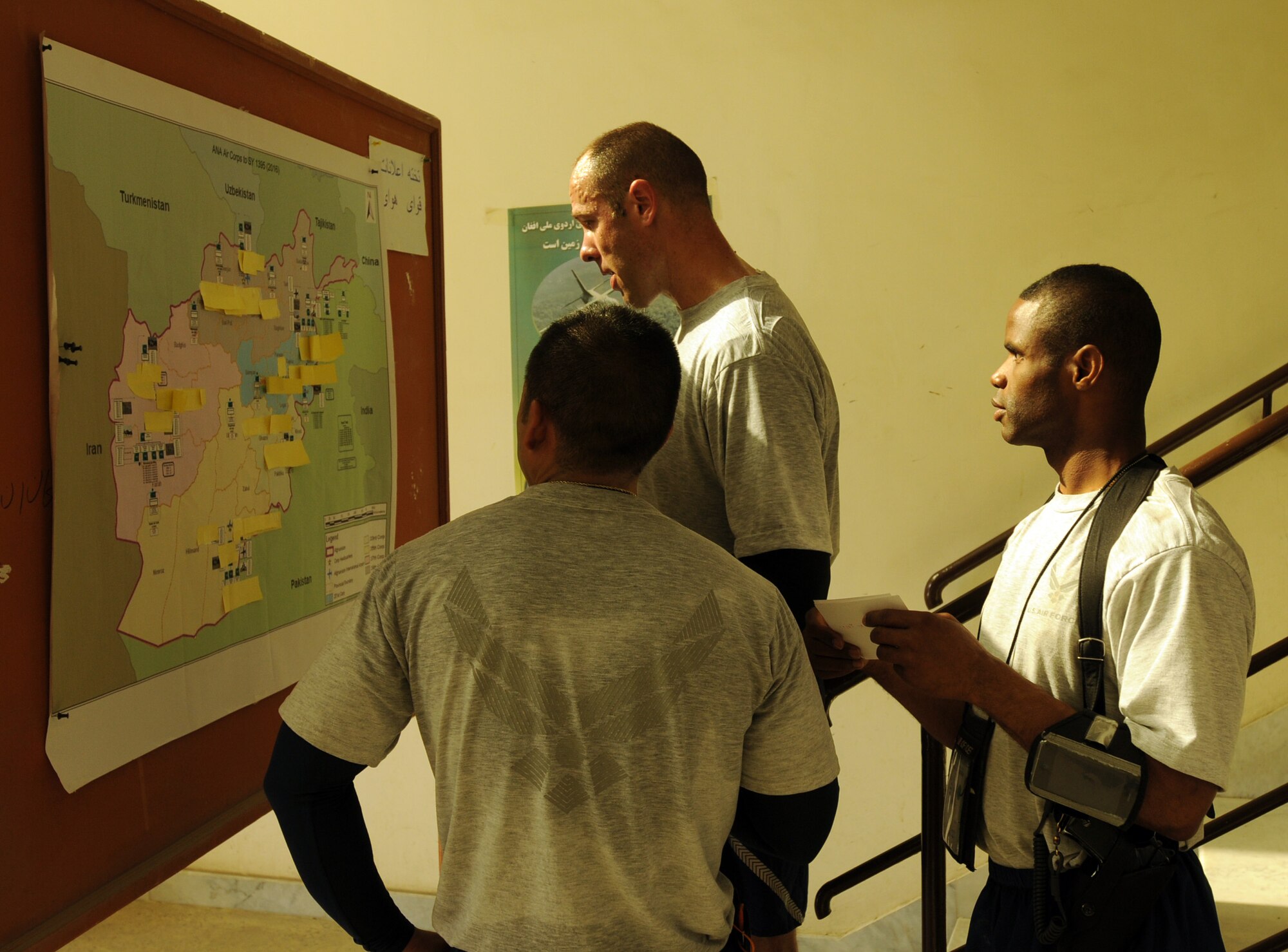 100827-N-6031Q-014 KABUL, Afghanistan - Airmen from the Combined Air Power Transition Force participate in the "Amazing Race" event held jointly at the International Security Assistance Force and Afghan Air Force base's on Aug. 27, 2010. The race was both physically and mentally challenging as the contestants would decipher clues that would lead them to the variety of mixed events during the race including volleyball, face paint and blind ball toss, map reading. (US Navy photo by Mass Communication Specialist 2nd Class David Quillen/ RELEASED).