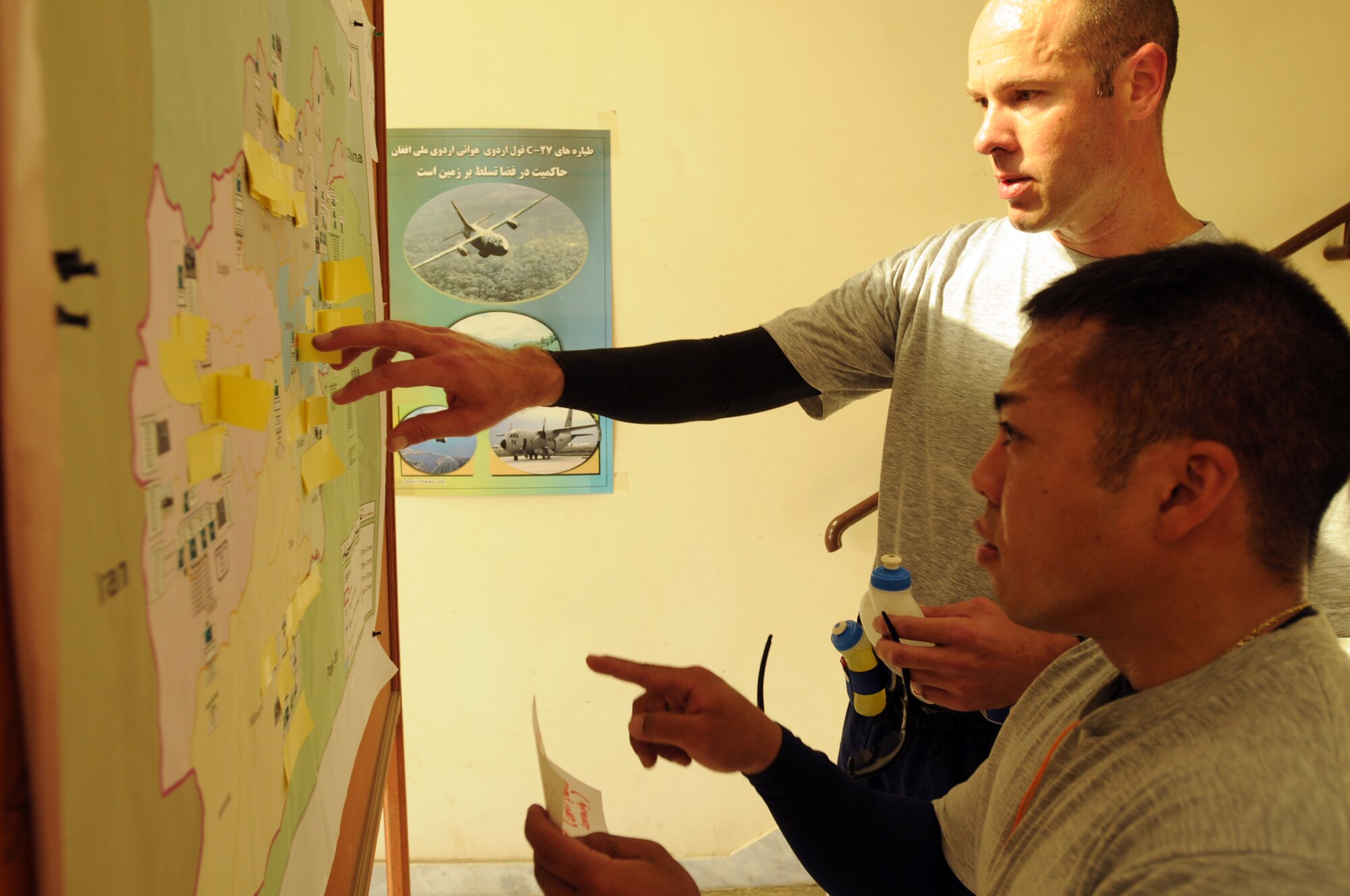 100827-N-6031Q-013 KABUL, Afghanistan - Airmen from the Combined Air Power Transition Force participate in the "Amazing Race" event held jointly at the International Security Assistance Force and Afghan Air Force base's on Aug. 27, 2010. The race was both physically and mentally challenging as the contestants would decipher clues that would lead them to the variety of mixed events during the race including volleyball, face paint and blind ball toss, map reading. (US Navy photo by Mass Communication Specialist 2nd Class David Quillen/ RELEASED).