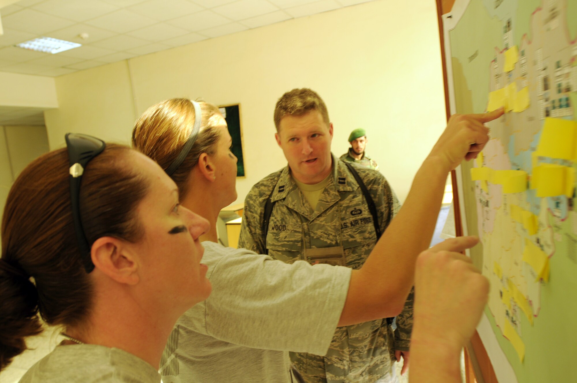 100827-N-6031Q-010 KABUL, Afghanistan - Airmen from the Combined Air Power Transition Force participate in the "Amazing Race" event held jointly at the International Security Assistance Force and Afghan Air Force base's on Aug. 27, 2010. The race was both physically and mentally challenging as the contestants would decipher clues that would lead them to the variety of mixed events during the race including volleyball, face paint and blind ball toss, map reading. (US Navy photo by Mass Communication Specialist 2nd Class David Quillen/ RELEASED).