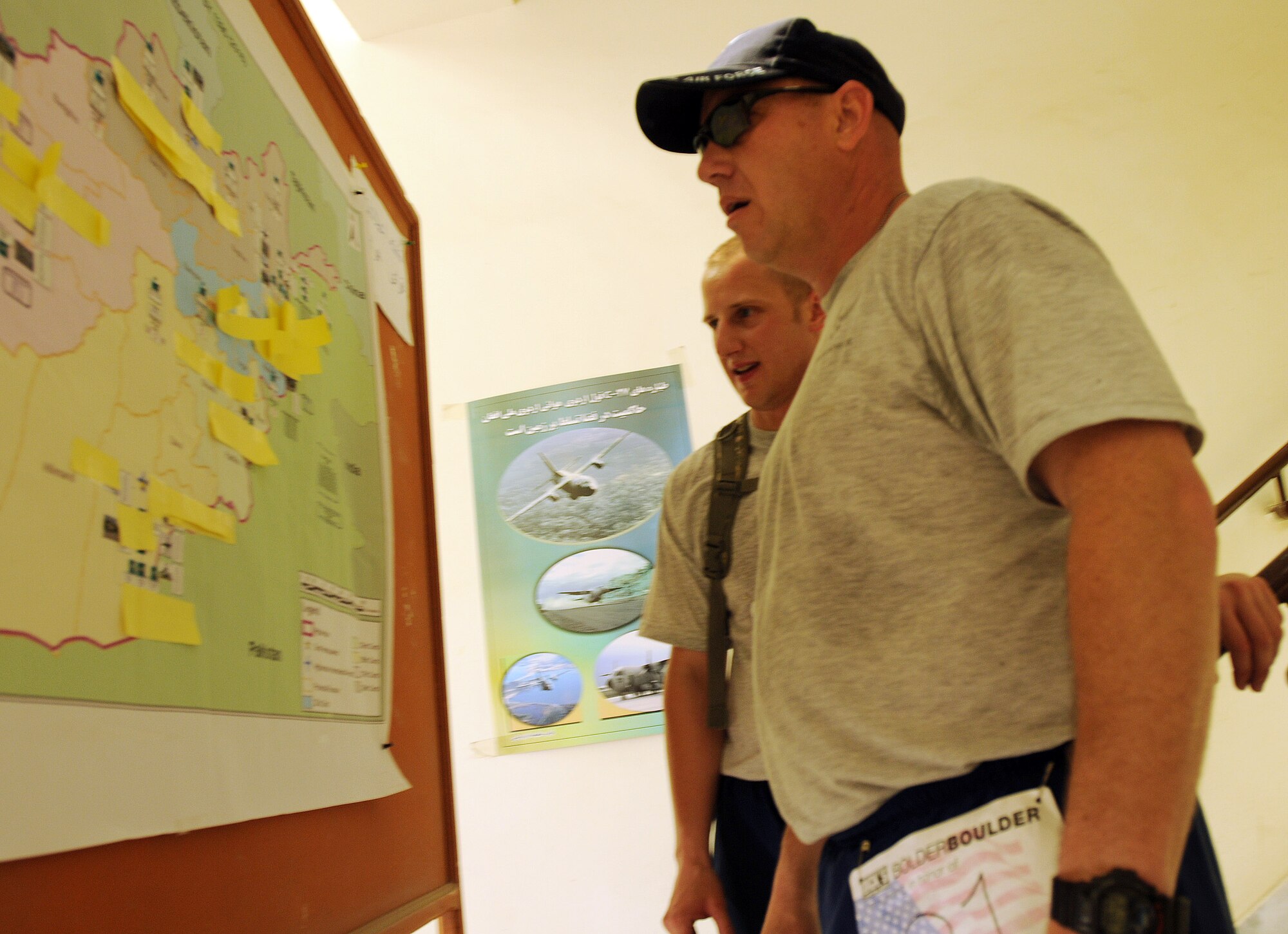 100827-N-6031Q-009 KABUL, Afghanistan - Airmen from the Combined Air Power Transition Force participate in the "Amazing Race" event held jointly at the International Security Assistance Force and Afghan Air Force base's on Aug. 27, 2010. The race was both physically and mentally challenging as the contestants would decipher clues that would lead them to the variety of mixed events during the race including volleyball, face paint and blind ball toss, map reading. (US Navy photo by Mass Communication Specialist 2nd Class David Quillen/ RELEASED).