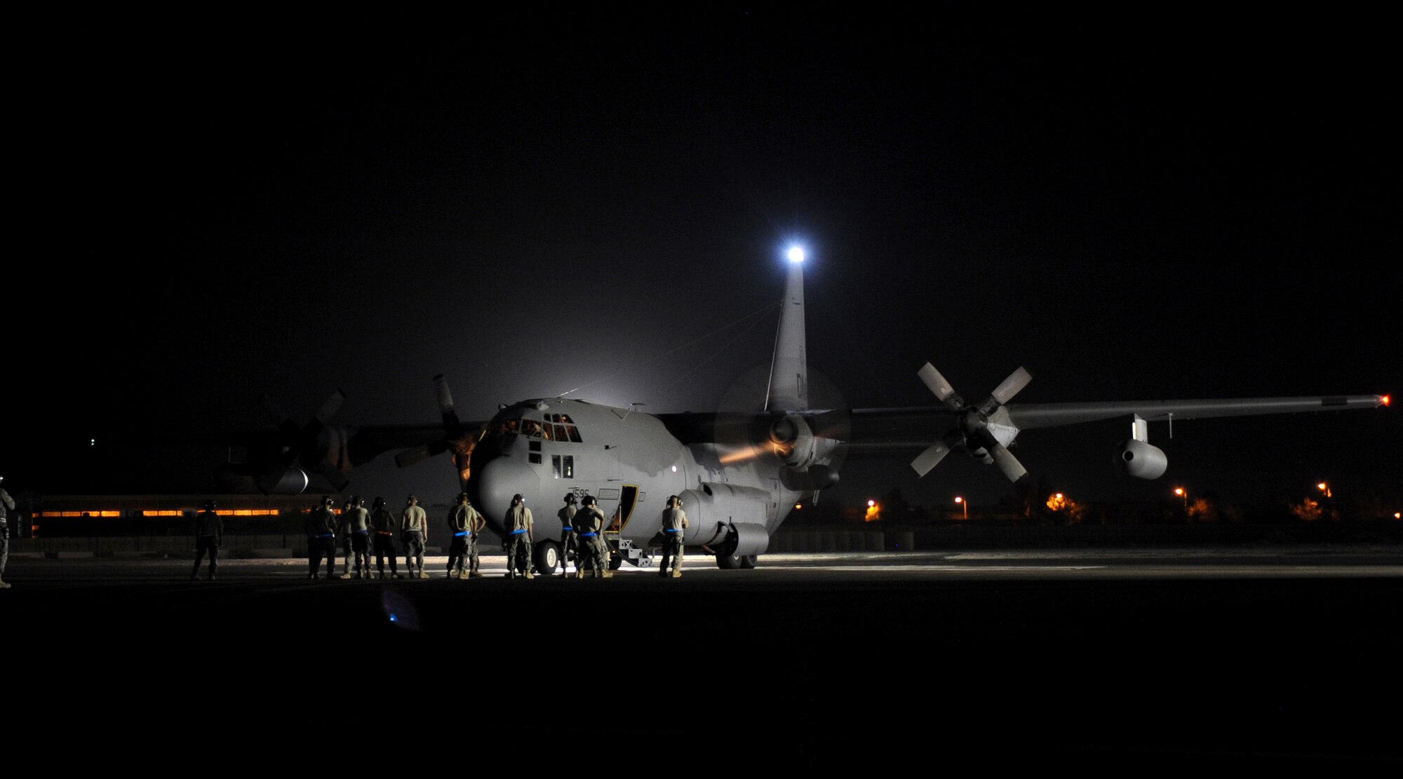 SOUTHWEST ASIA - A U.S. Air Force EC-130H aircraft assigned to the 43rd Expeditionary Electronic Combat Sqaudron is prepped for departure from an undisclosed air base here Aug. 29,  2010. The unit, which has been part of the 386th Air Expeditionary Wing for 6 1/2 years, is moving to another base in the U.S. Central Command area of responsibility becuase of the responsible drawdown of forces in Iraq. The EC-130H Compass Call aircraft provides U.S. forces with the ability to jam enemy communications. (U.S. Air Force photo by Senior Airman Laura Turner/Released)