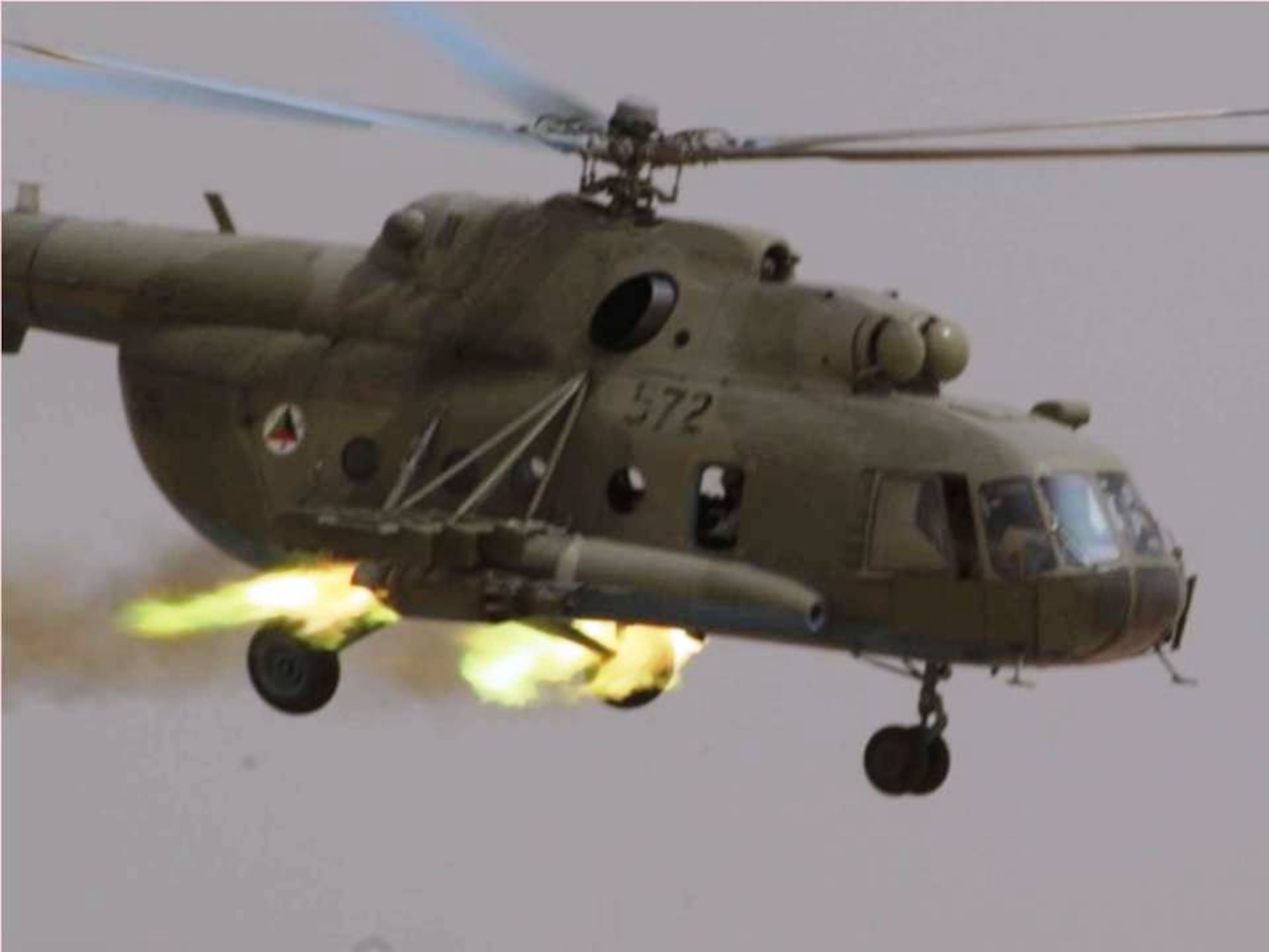 KANDAHAR, Afghanistan - An Afghan Air Force Mi-17 shoots 57 mm air-to-ground rockets during a training mission on Aug 27 & 28, 2010. (U.S. Military photo/RELEASED).