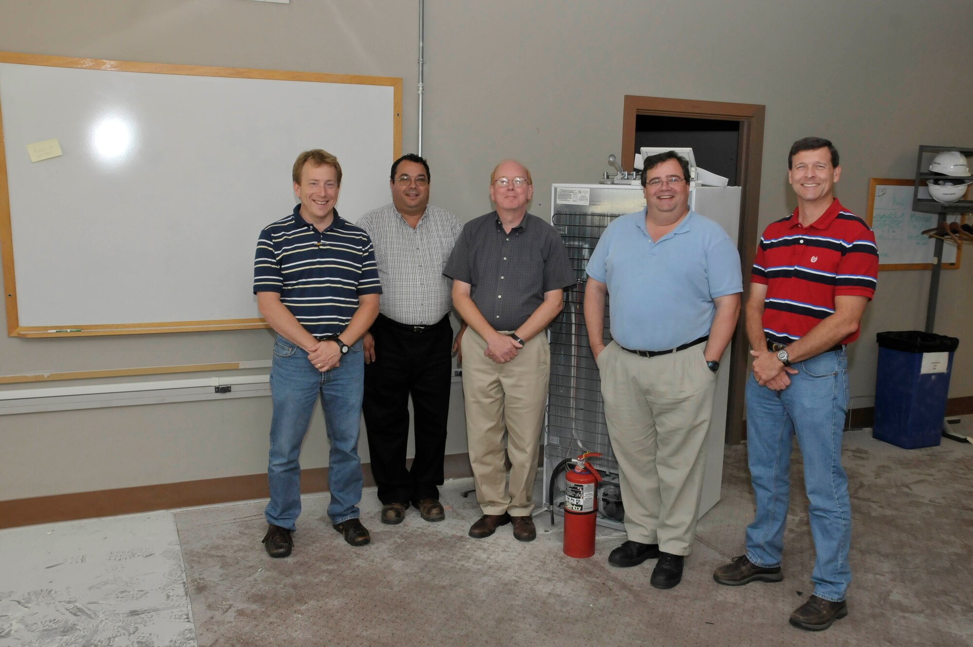 (Left to right) John Wright, Mickey West, David Harrison, Chris Bird, Ricky Mead and Steve Simpson, who is not pictured, were lauded for their response to a recent refrigerator fire. (Photo by Rick Goodfriend)