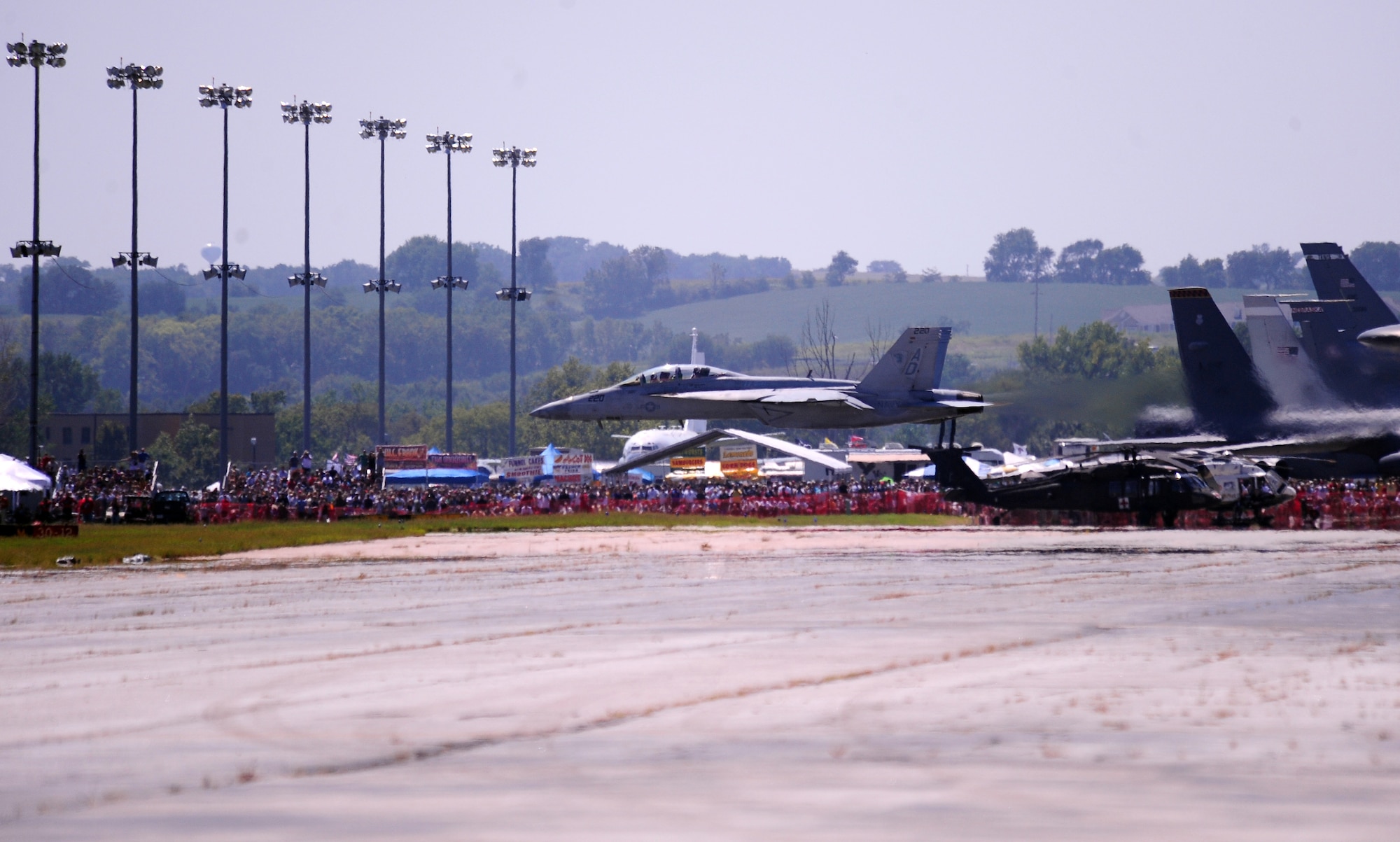 OFFUTT AIR FORCE BASE, Neb. - An F/A 18 Super Hornet does a low fly-by along the runway as part of the 2010 Defenders of Freedom Open House and Air Show Aug. 28.  The Hornet was one of several aerial demonstrations, including the F-22 Raptor and U.S. Air Force Thunderbirds. U.S. Air Force photo by Josh Plueger
