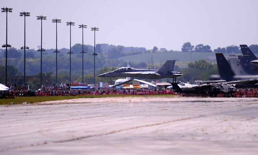OFFUTT AIR FORCE BASE, Neb. - An F/A 18 Super Hornet does a low fly-by along the runway as part of the 2010 Defenders of Freedom Open House and Air Show Aug. 28.  The Hornet was one of several aerial demonstrations, including the F-22 Raptor and U.S. Air Force Thunderbirds. U.S. Air Force photo by Josh Plueger
