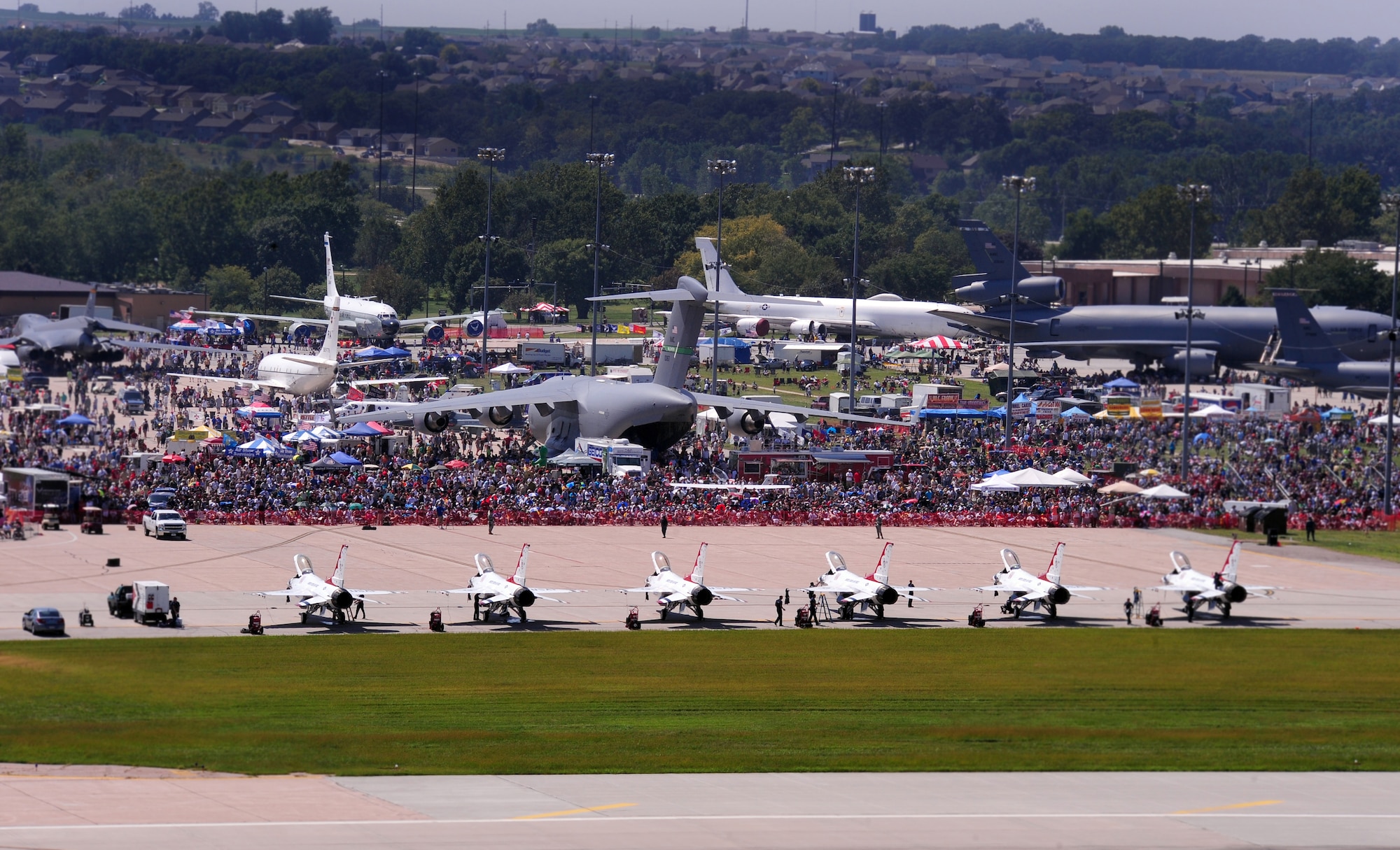 OFFUTT AIR FORCE BASE, Neb. - Tens of thousands of people attended the 2010 Defenders of Freedom Open House and Air Show Aug. 28 to witness numerous aerial demonstrations such as the F-22 Raptor and U.S. Air Force Thunderbirds. The show also included ground shows and static aircraft displays. U.S. Air Force photo by Josh Plueger
