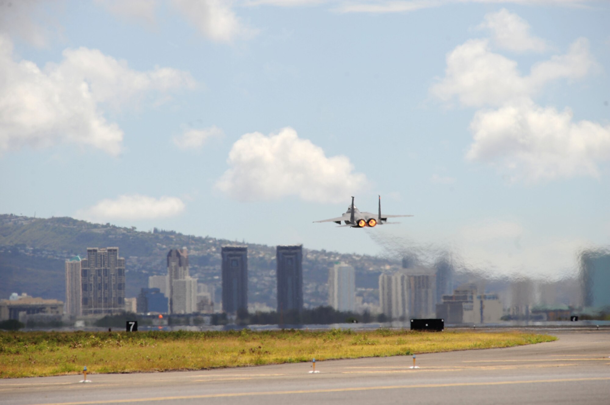 JOINT BASE PEARL HARBOR-HICKAM, Hawaii - F-15 Eagle pilot, Lt. Col Mark "Odie" Ladtkow of the 199th Fighter Squadron, Hawaii Air National Guard, Joint Base Pearl Harbor-Hickam, takes off for his last F-15 training mission on Aug. 25 while at Hickam. The 199th is transitioning from the F-15 to the F-22 Raptor, which is a fifth generation fighter. The 199th has flown the F-15 since 1987 and received their first two Raptors on July 9, 2010.  (U.S.  Air Force photo/Tech Sgt. Cohen A. Young)