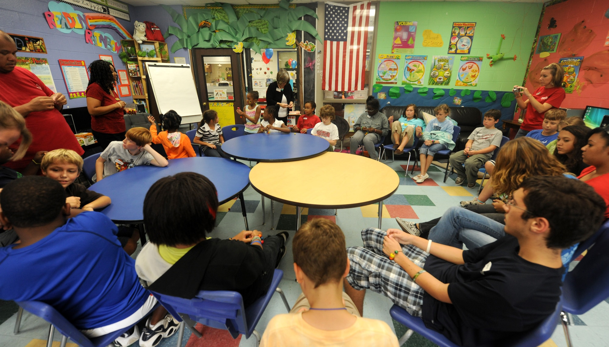 MOODY AIR FORCE BASE, Ga. -- Youth Center members gather in a circle to participate in the Family Resiliency Training Workshop held here Aug. 27. Nearly 30 children participated in the workshop and were taught the skills to face challenges and the stresses of military life. (U.S. Air Force photo/ Airman 1st Class Benjamin Wiseman)