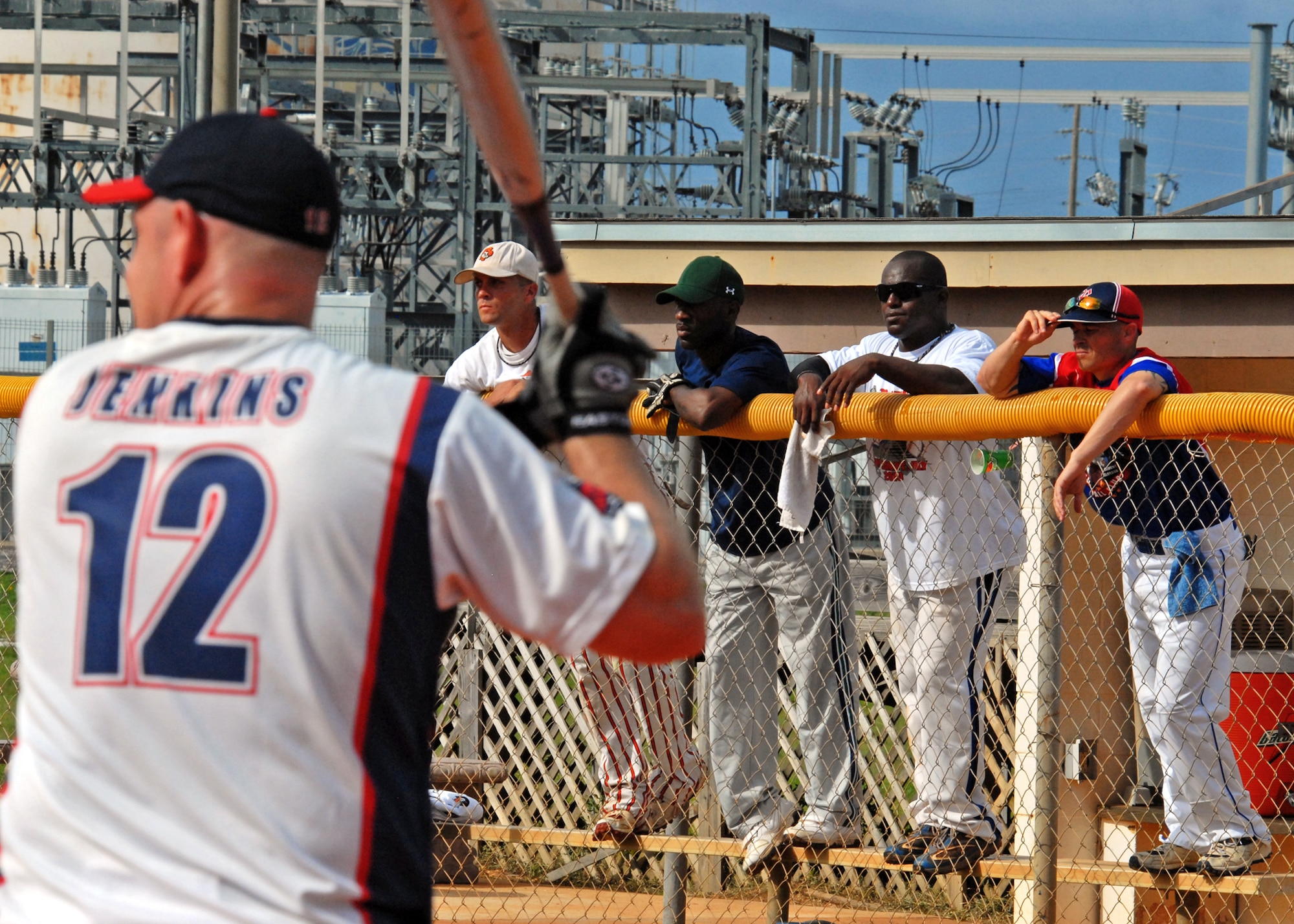 The batter’s teammates were up on the fence watching and supporting during a practice game Aug. 27.  The Air Force Softball team began tryouts and practice last week at Eglin Air Force Base, Fla.  The head coach will sort through 26 players to fill the 14-man roster prior to competing in the Armed Forces Championship, Sept. 18-24.  The Air Force team won the championship last year.  (U.S. Air Force photo/Samuel King Jr.)